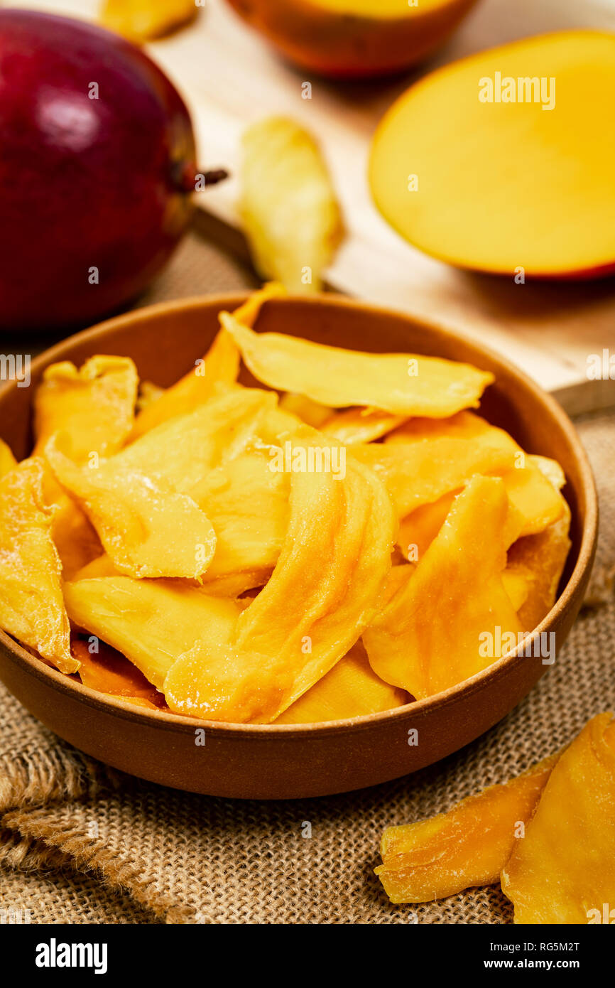 Dried Mango Fruit on Old Wooden Background Stock Photo