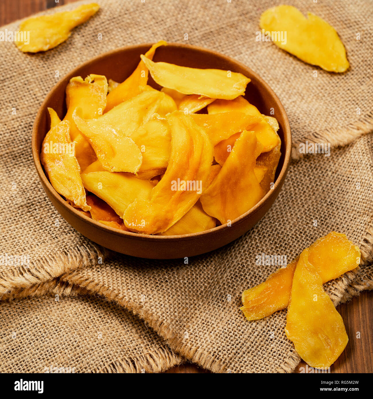 Dried Mango Fruit on Old Wooden Background Stock Photo