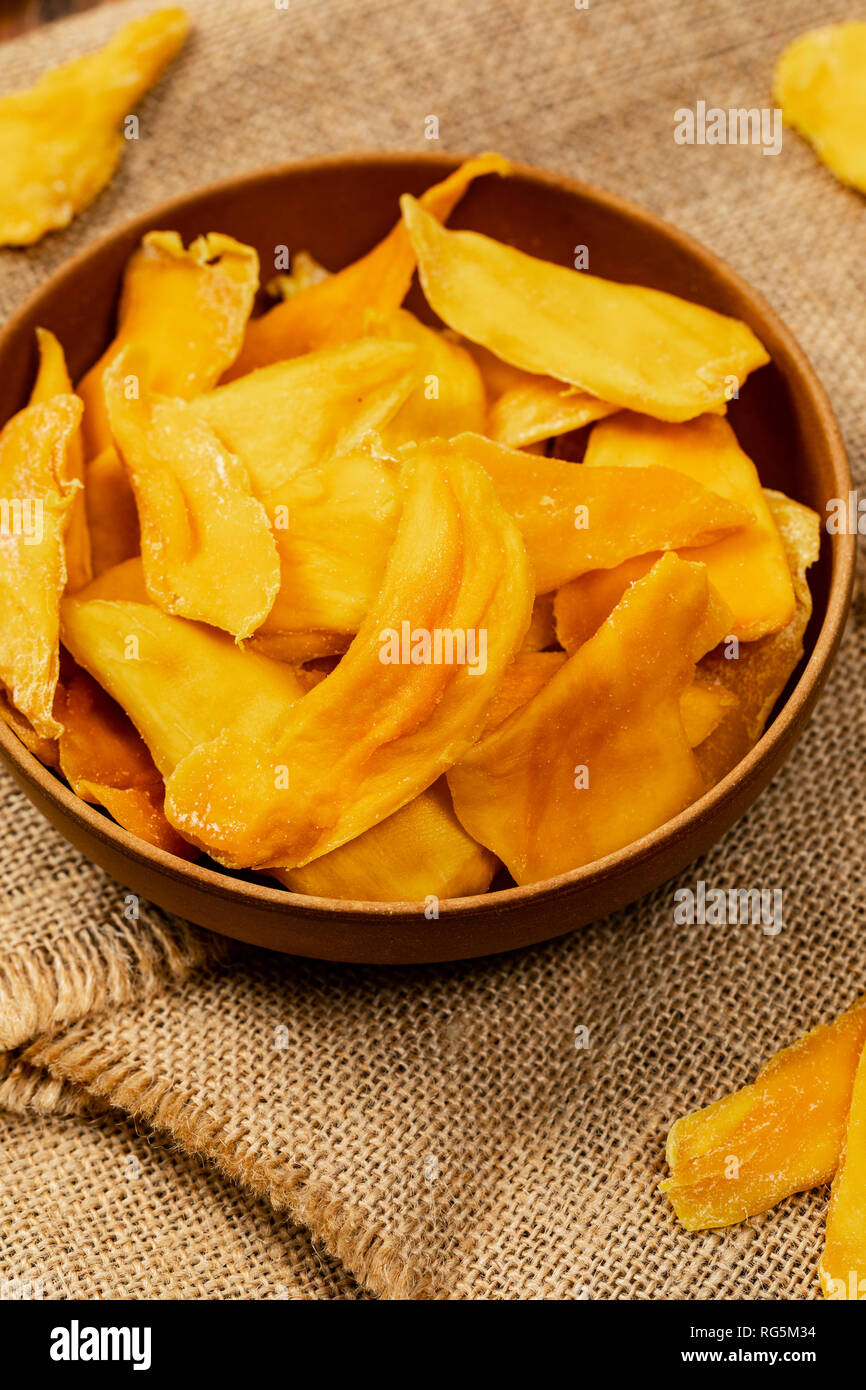 Dried Mango Fruit on Old Wooden Background Stock Photo