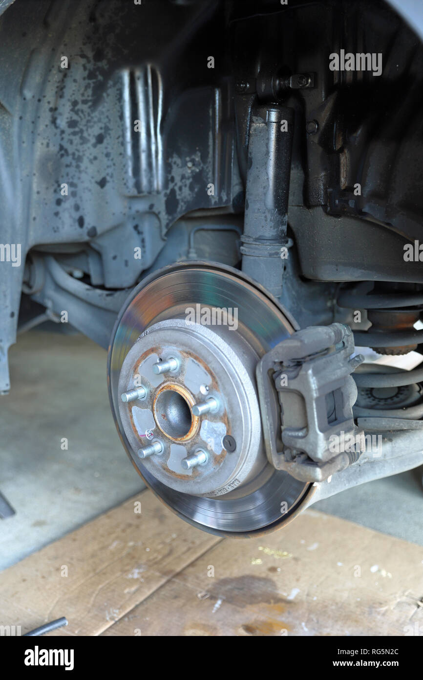 Vehicle disc brakes, rotor, caliper, and pads Stock Photo