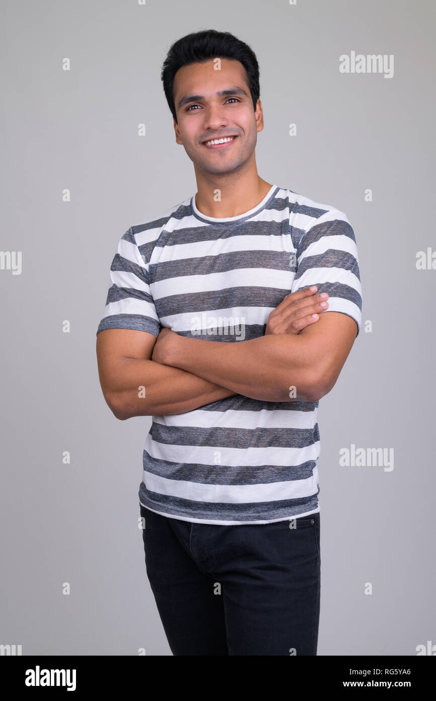 South indian man standing arms hi-res stock photography and images - Alamy