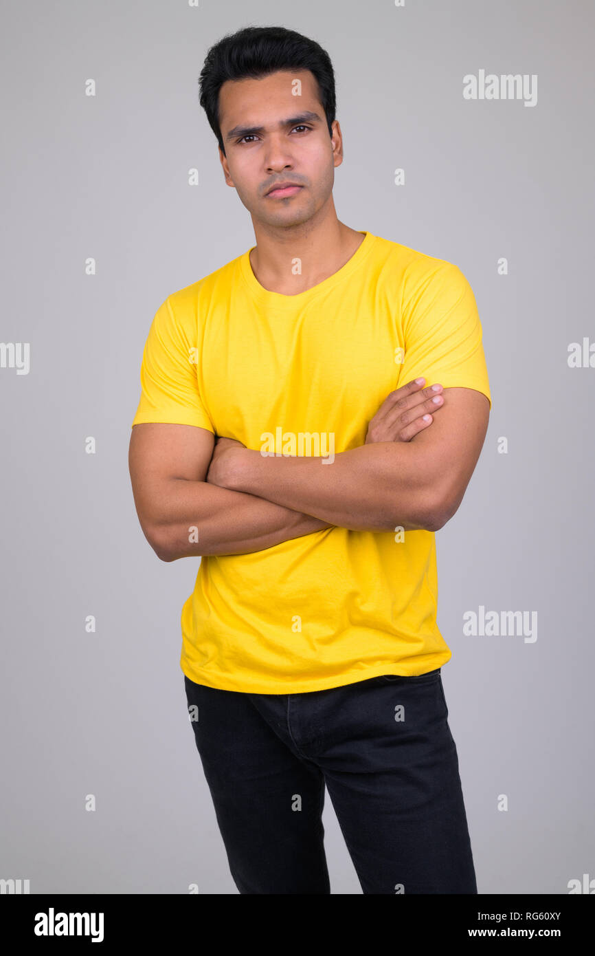 South indian man standing arms hi-res stock photography and images - Alamy