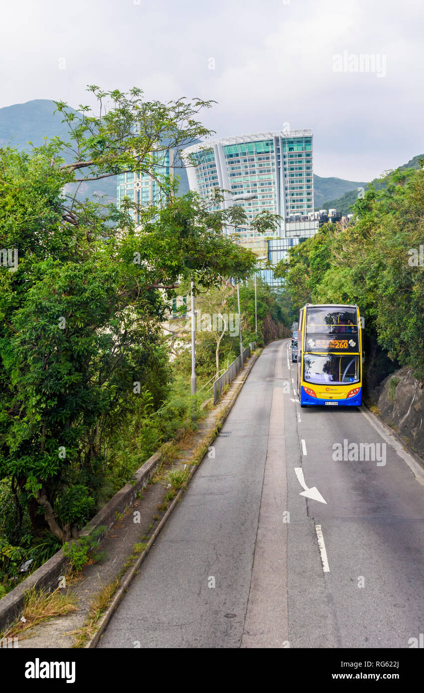 Double Decker bus travelling on Repulse Bay Rd, Hong Kong Stock Photo