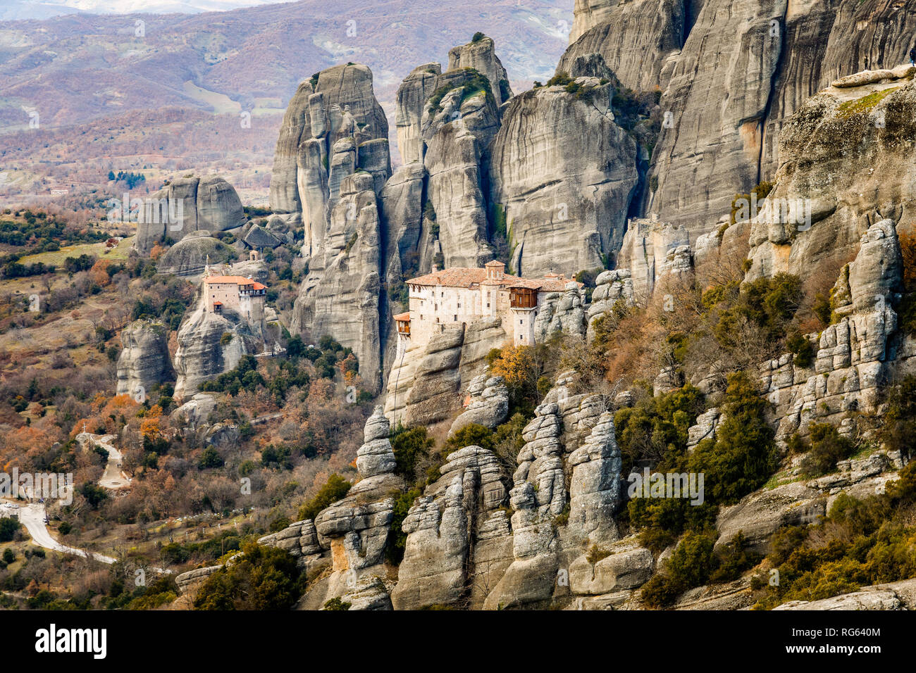 The Holy Monastery of Roussanou and Monastery of Agios Nikolaos Anapafsas  situated on the steep cliffs, mountains panorama, Kalampaka, Trikala, Thess Stock Photo