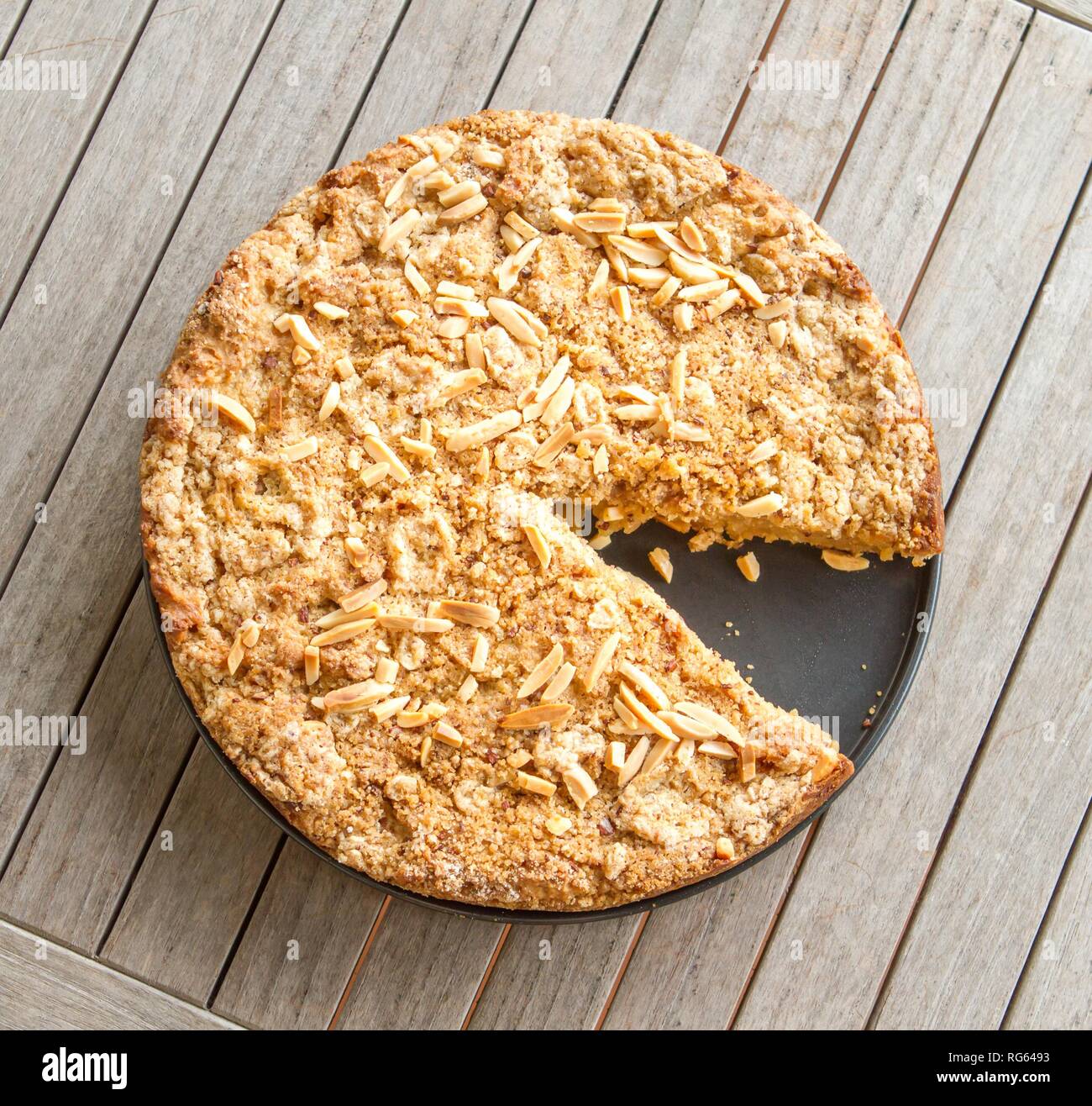 Grated apple cinnamon cake with almond chips Stock Photo Alamy