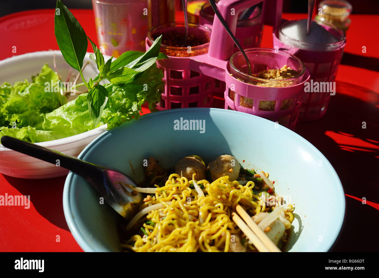 Egg noodle and spicy soup in Thai street market Stock Photo Alamy
