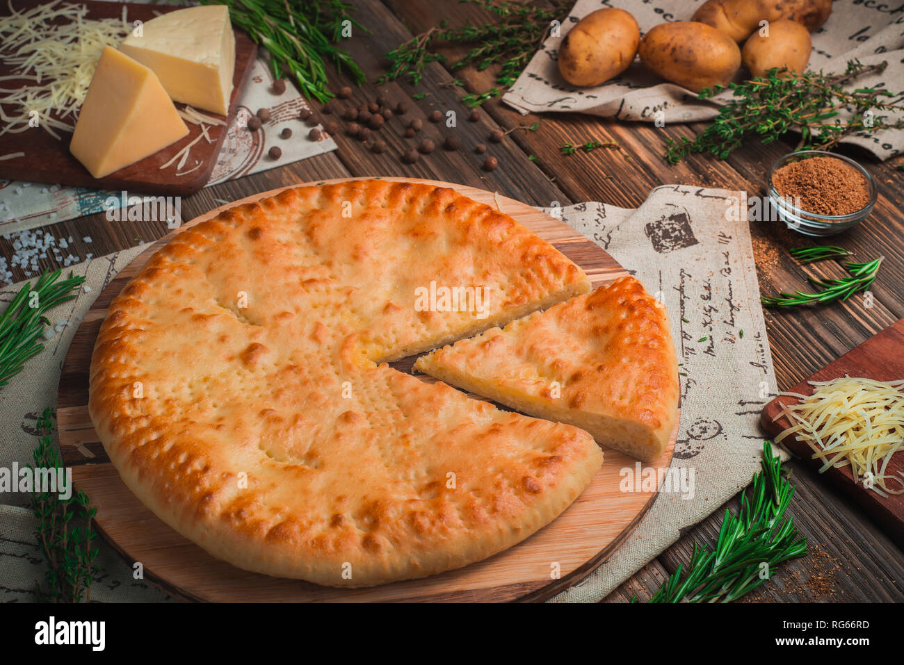 Homemade pie with potatoes and cheese. Traditional baking concept, warm