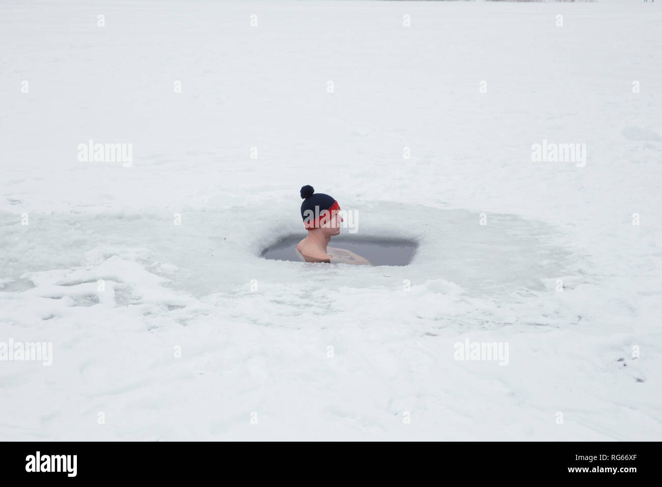 City Riga, Latvia. Peoples swimmning in winter. Cold water, snow an peoples. Travel photo 2019, 27. january. Stock Photo