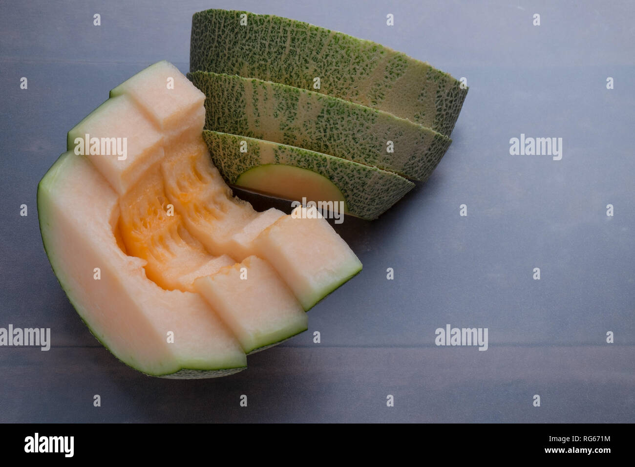 Slice melon on table Stock Photo
