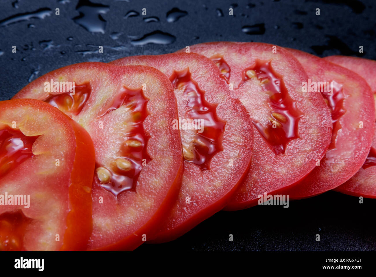Juicy tomato hi-res stock photography and images - Alamy