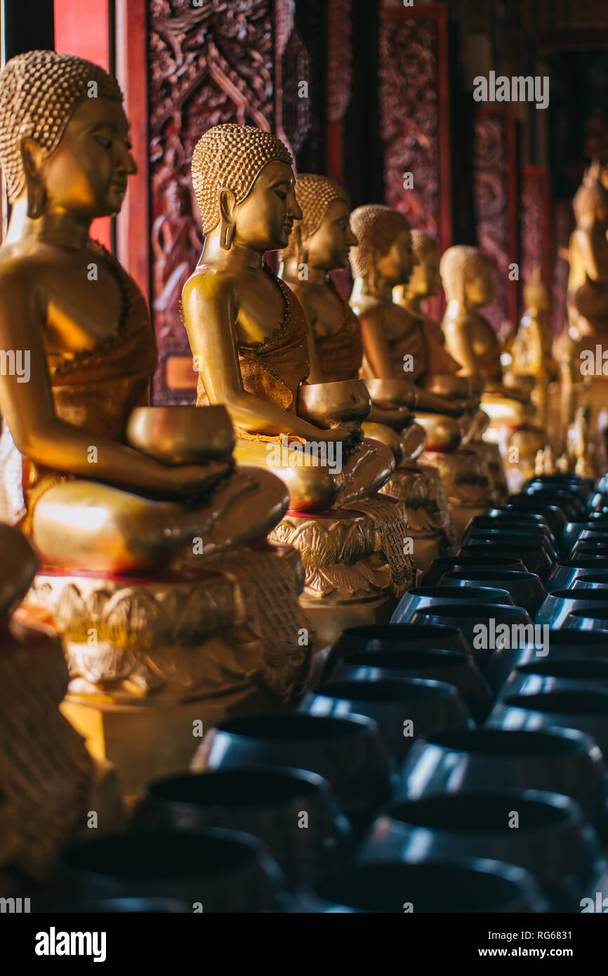 Golden statue buddha in Thai buddist temple Stock Photo - Alamy