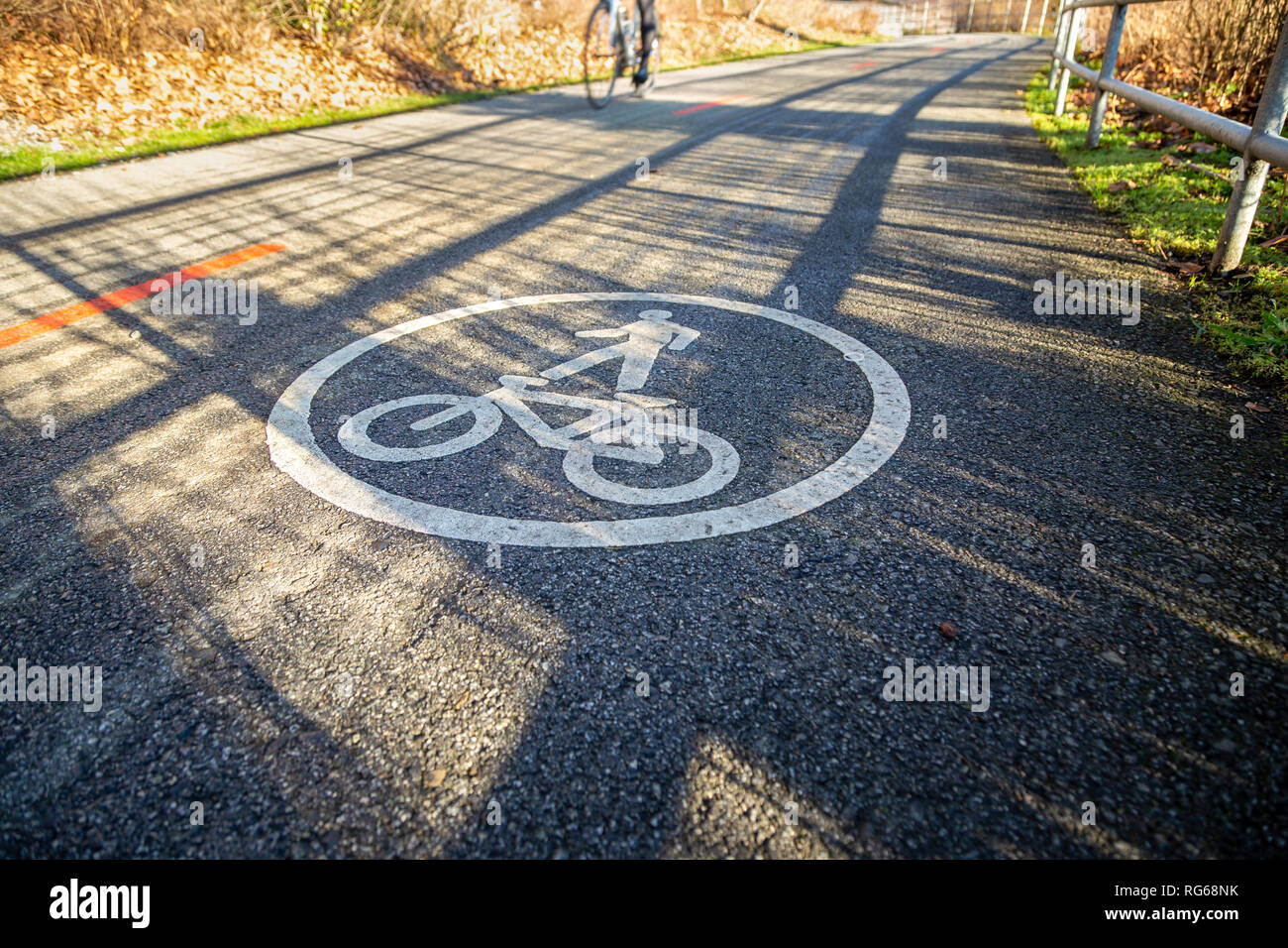 Bike path in North Vancouver with a bicycle in the background. Stock Photo