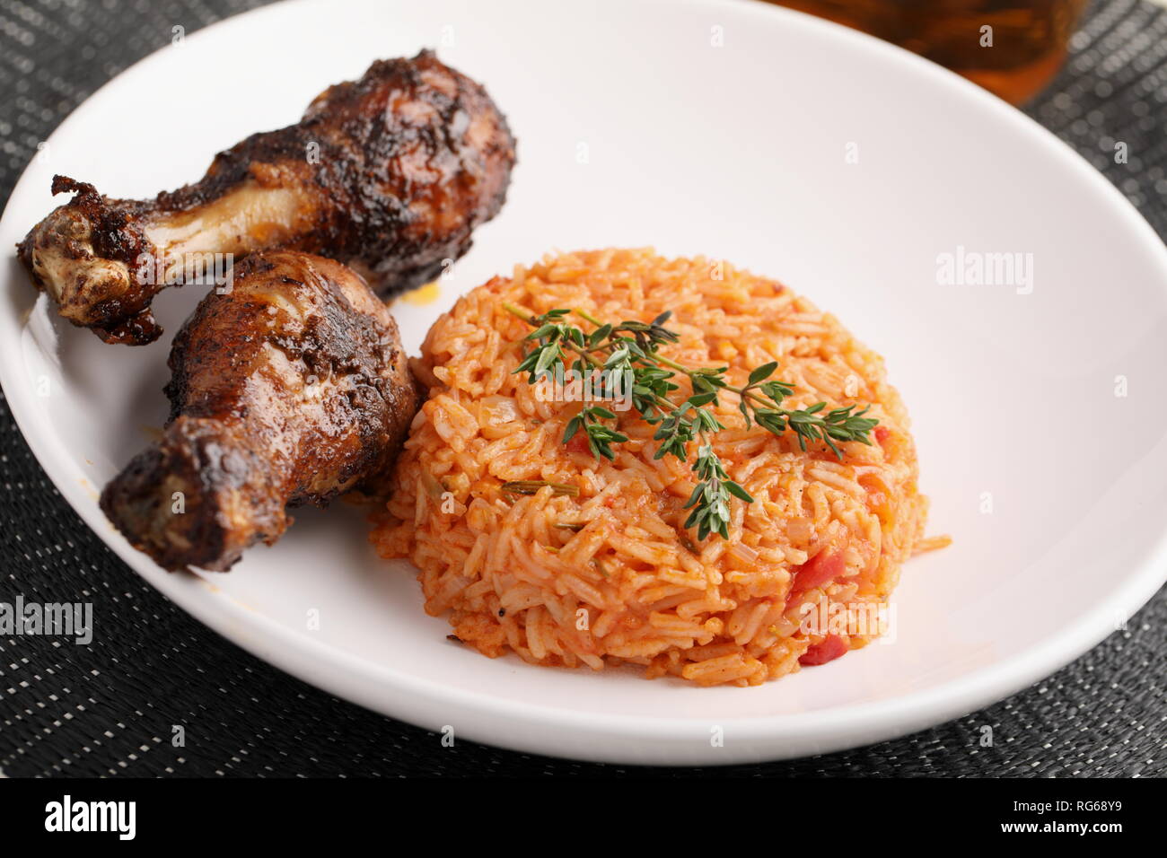 Jollof rice and fried chicken hires stock photography and images Alamy