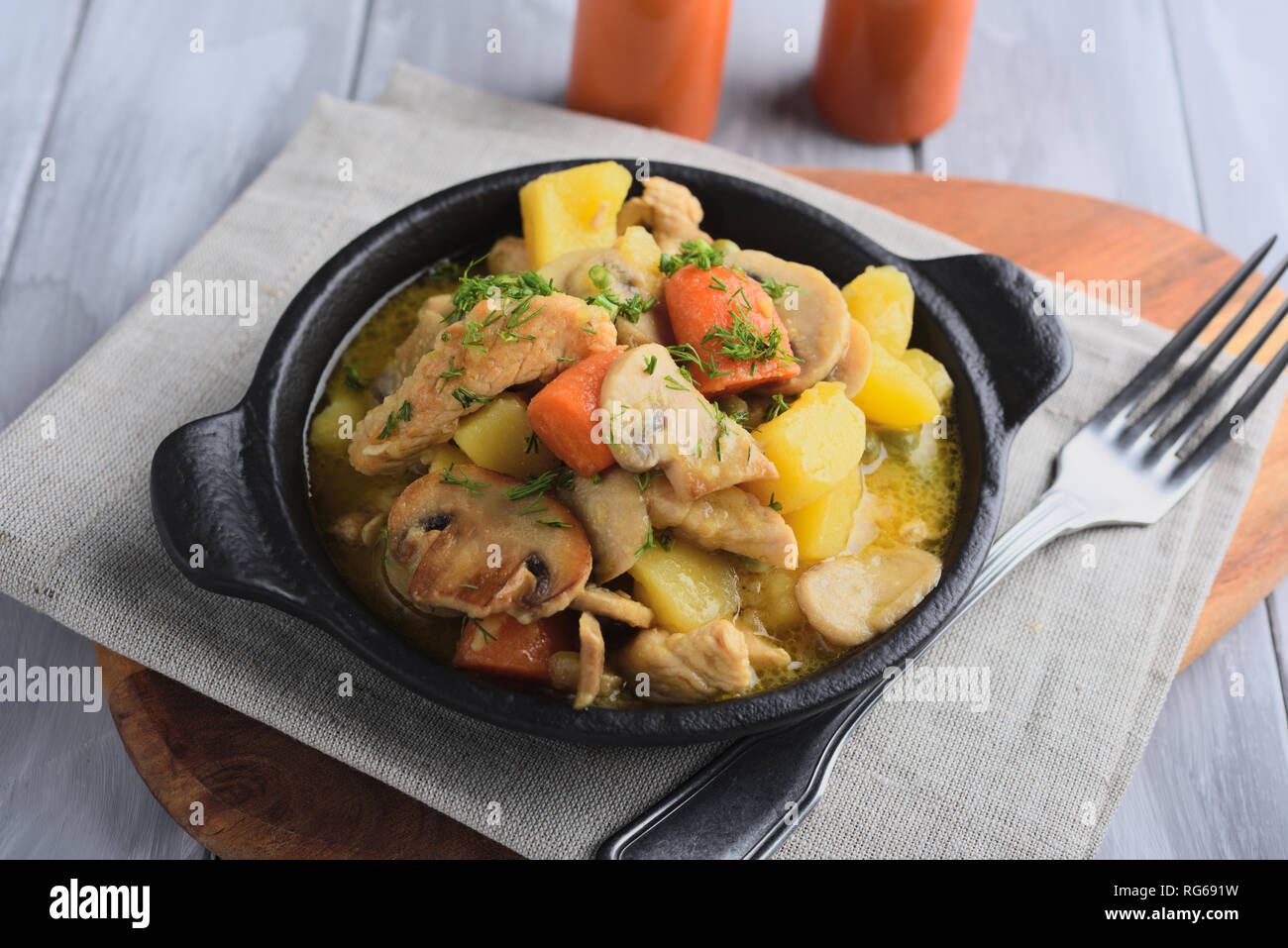 Chicken and Mushroom Fricassee with potato, carrot, green peas, and
