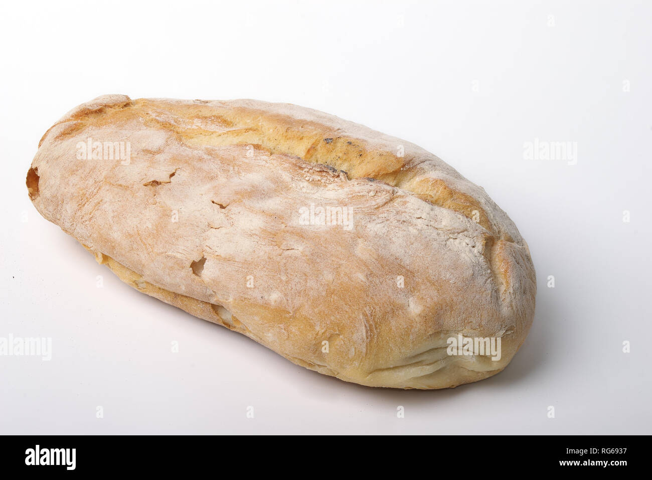 Loaf of bread in a paper bag against white background Stock Photo - Alamy
