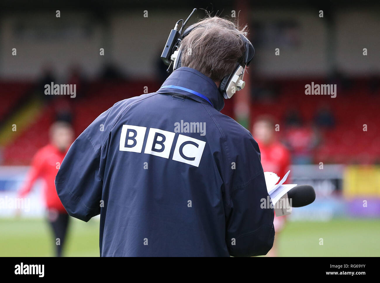 BBC radio journalist broadcasting during the EFL League 2 match between Swindon Town and Crawley Town at the County Ground in Swindon. 26 January 2019. Editorial use only. No merchandising. For Football images FA and Premier League restrictions apply inc. no internet/mobile usage without FAPL license - for details contact Football Dataco Stock Photo