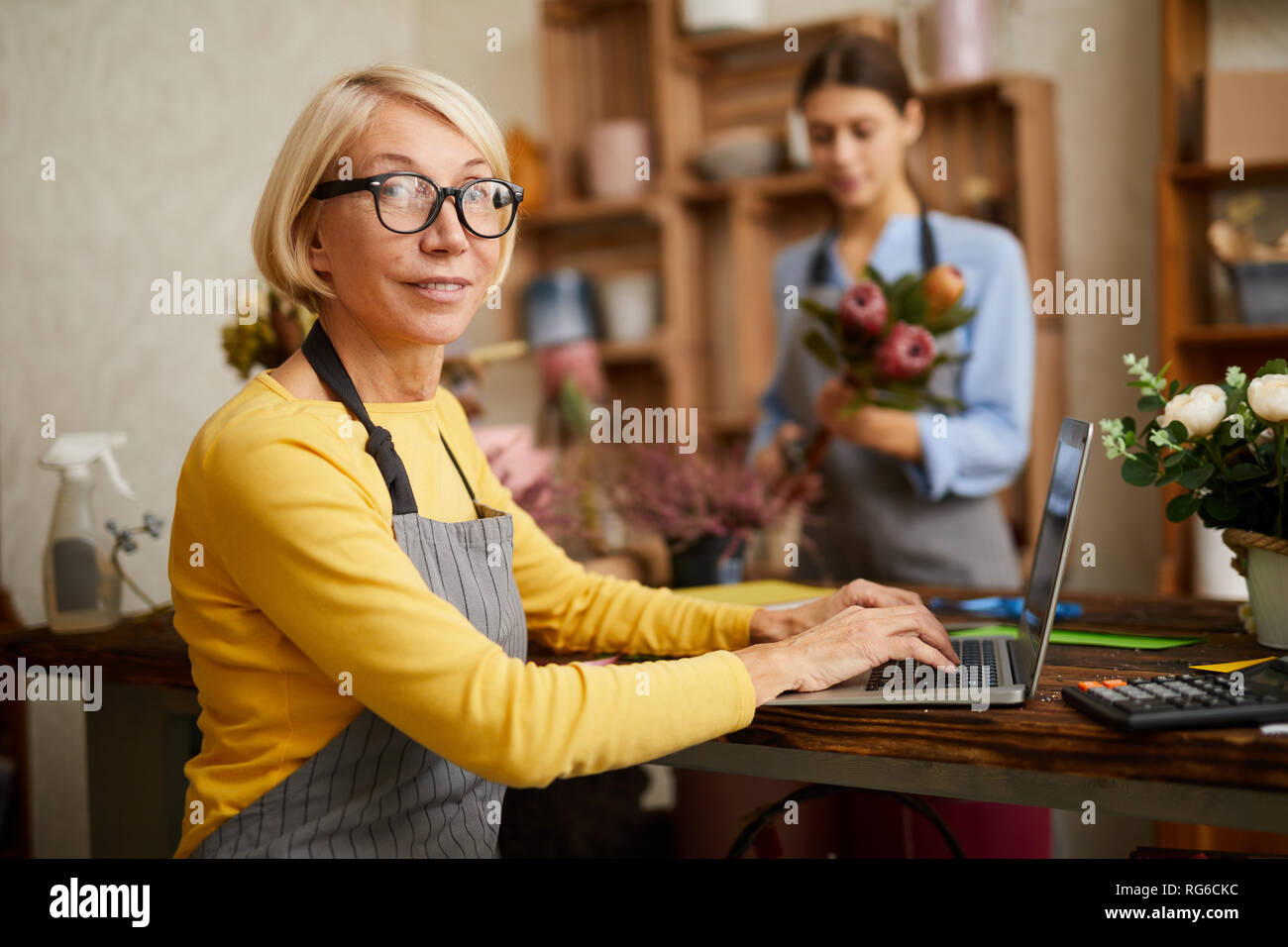 Mature Shop Owner Stock Photo