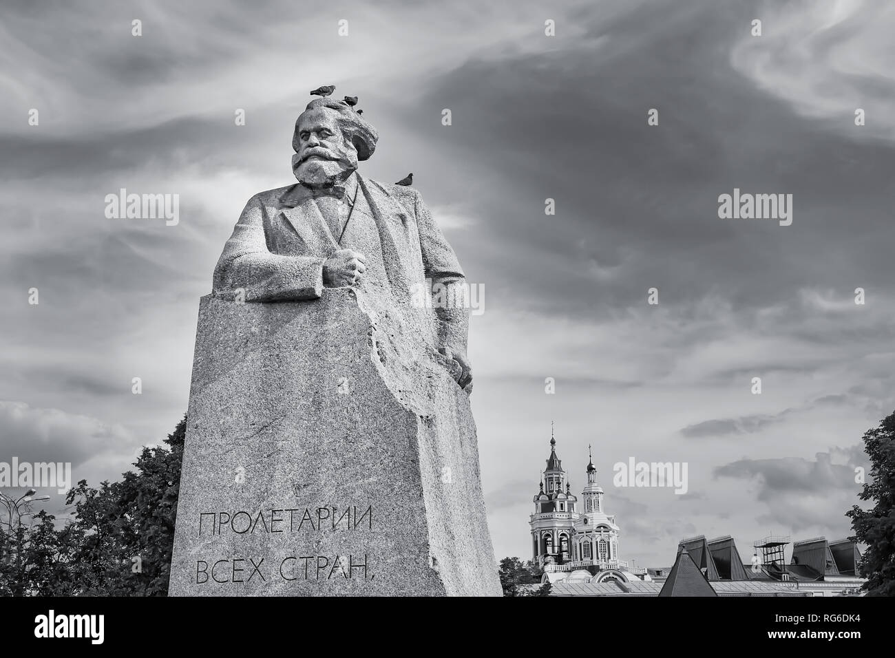 MOSCOW. RUSSIA - JUNE 14 2016 Karl Marx statue with birds on it. Dramatic black and white image Stock Photo
