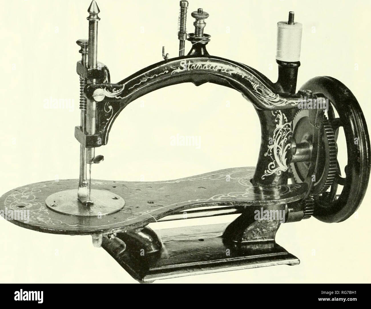 . Bulletin - United States National Museum. Science. Figure 123.—Standard sewing machine of about 1870. This chainstitch machine is believed to have been made by the company that later became the Standard Shuttle Sewing Machine Company, when they began manufactur- ing lockstitch machines about 1874. This machine is marked with the name, &quot;Standard,&quot; and with the dates ''Patented July 14, 1870, Patented Jan. 22, 1856, Dec. 9, 1856, Dec. 12, 1865.&quot; The dates refer to the reissue and extended reissue of the Bachelder and the A. B. Wilson patents. The number of chain- stitch machines Stock Photo