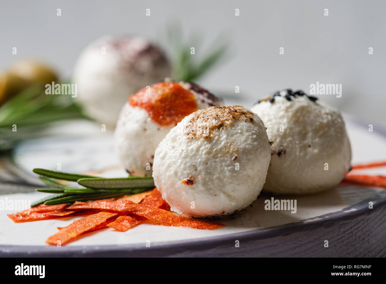 Fresh arabic cheese macro with Rosemary, Nigella, Kalindzhi, Sumy, Garam Masala Stock Photo