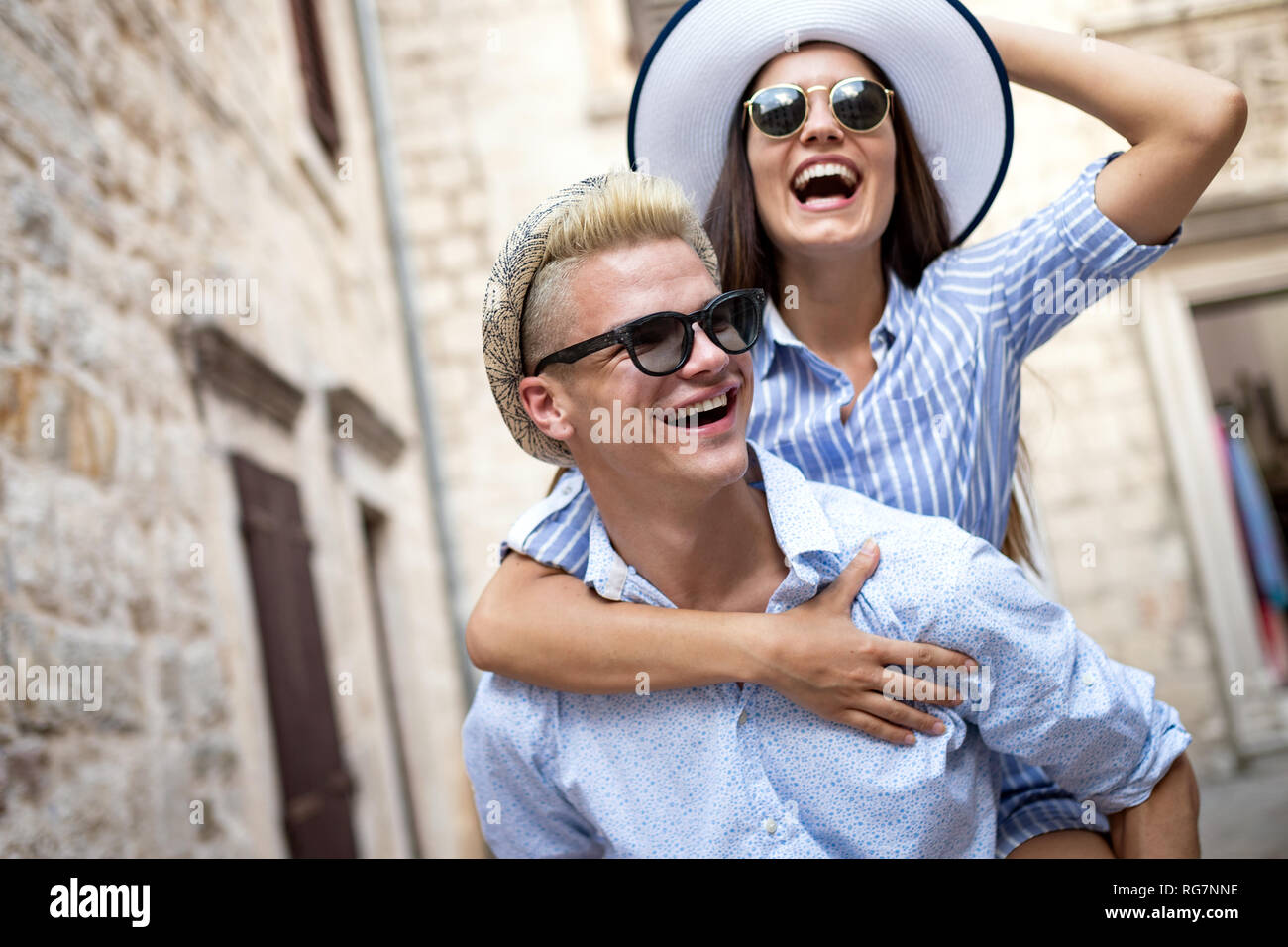 Tourist couple in love enjoying city sightseeing at summer Stock Photo