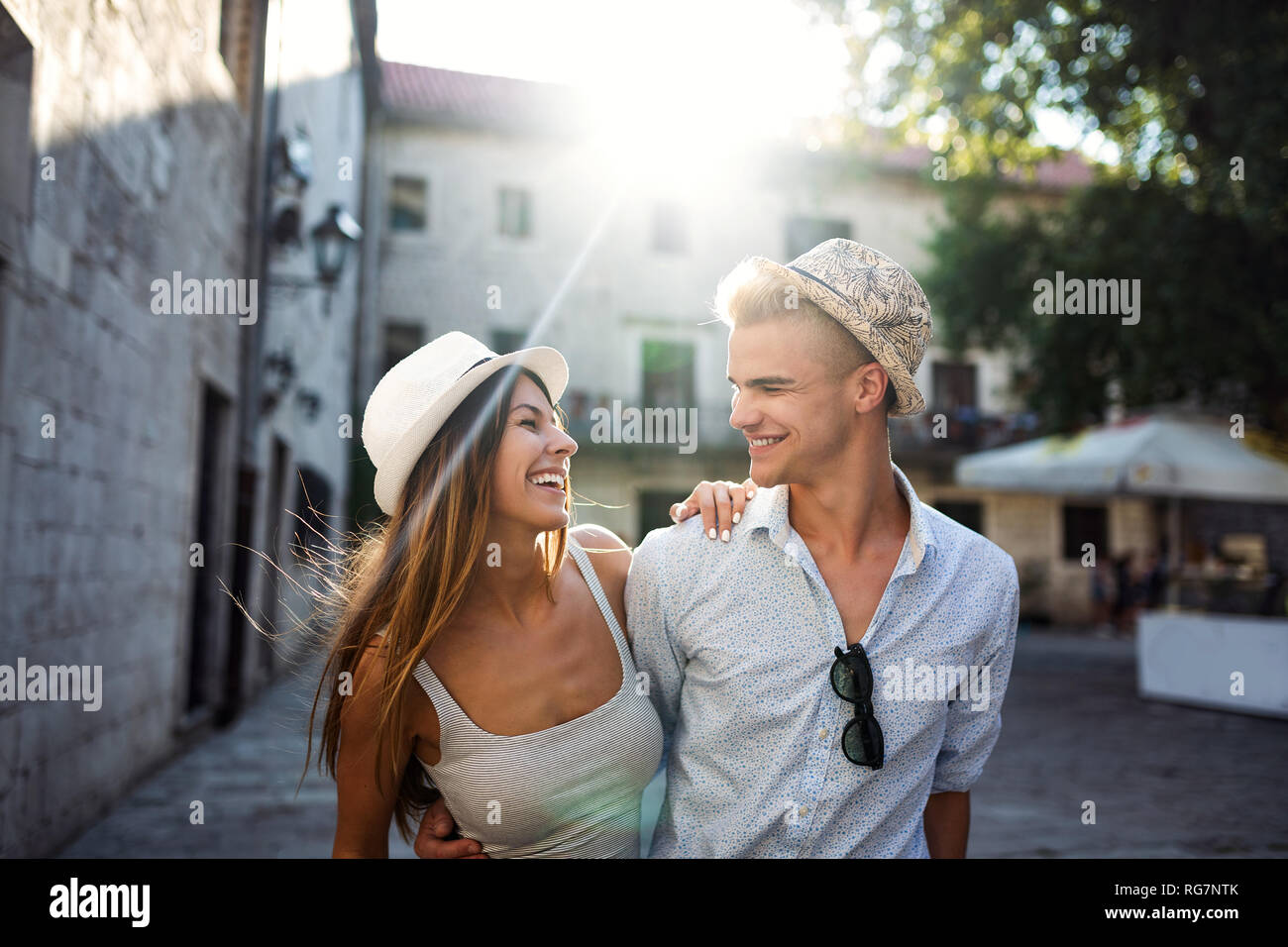 Tourist couple in love enjoying city sightseeing at summer Stock Photo