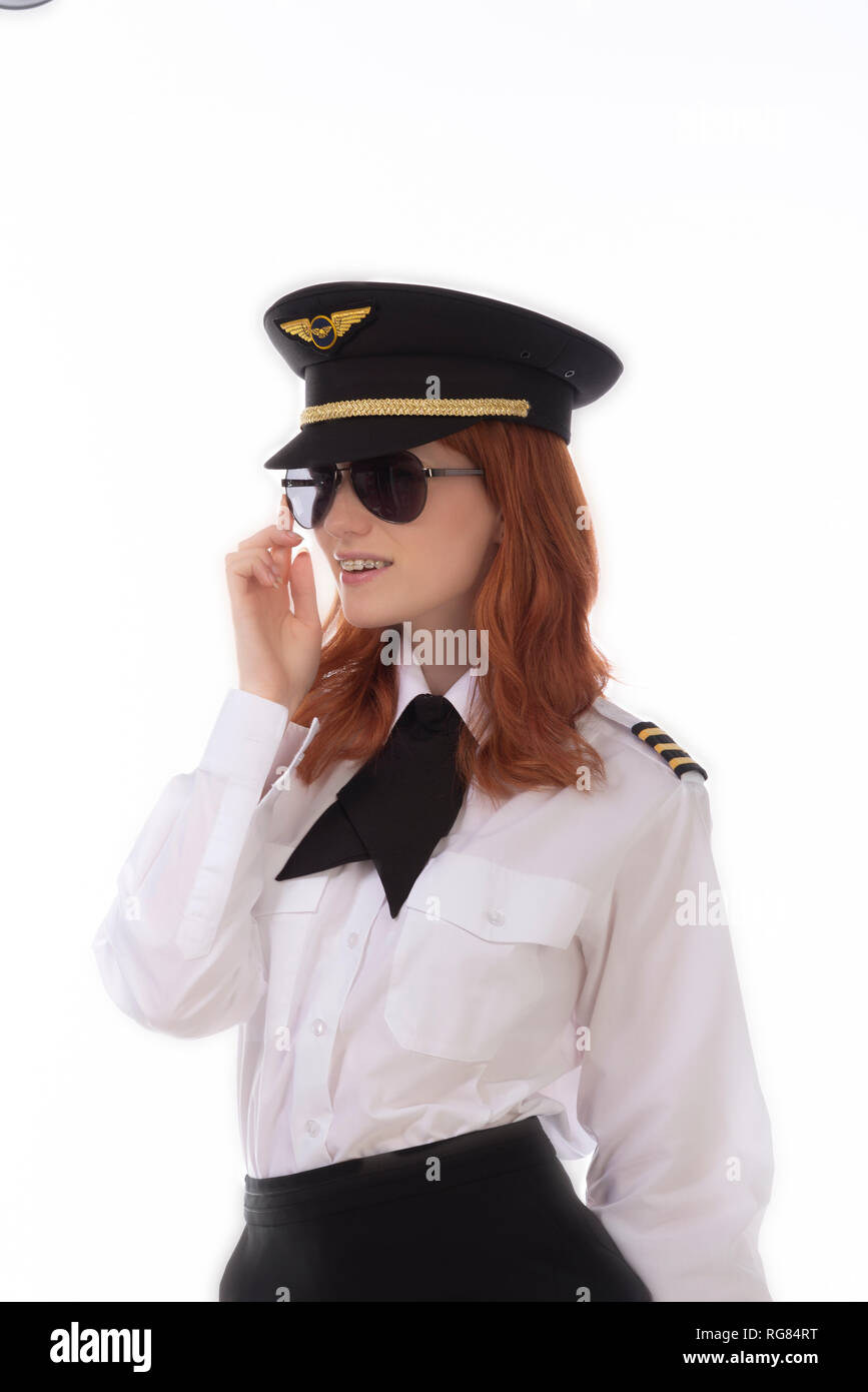 Young female pilot with red hair 