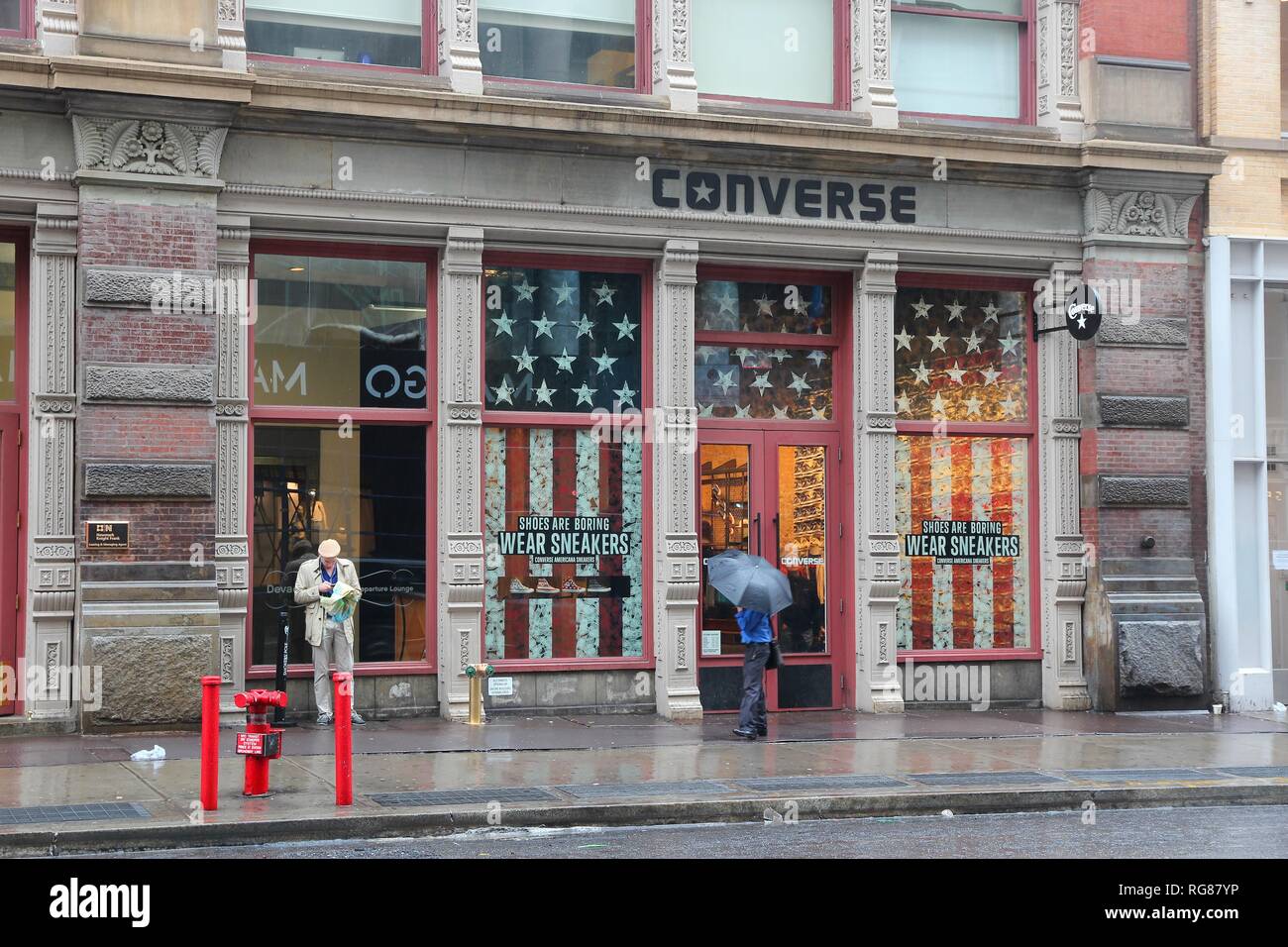 NEW YORK, USA - JUNE 7, People visit Converse store in Broadway, New Broadway is a famous 33 miles long street starting in Manhattan Stock Photo - Alamy