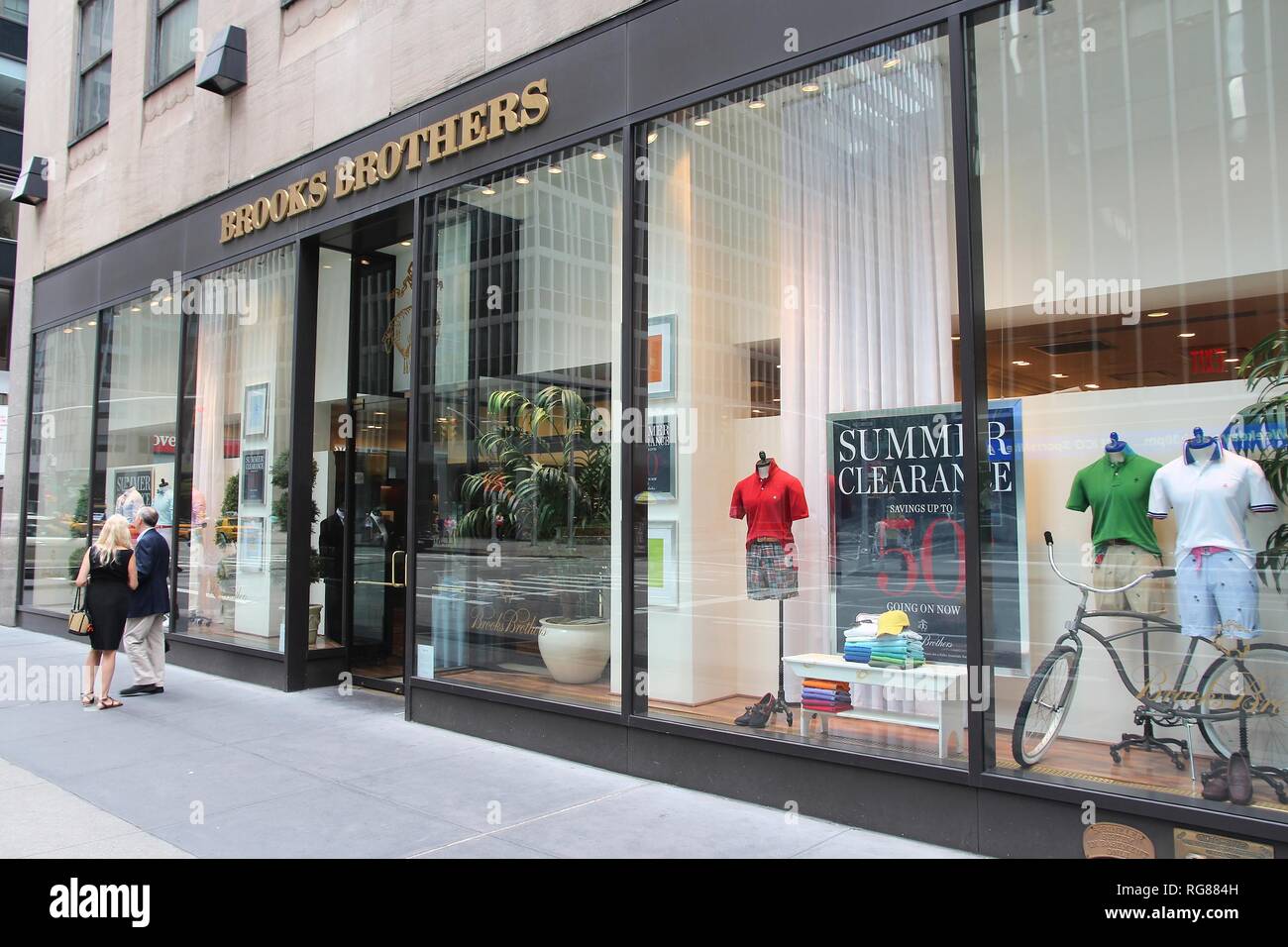 NEW YORK, USA JULY 4, 2013 People walk by Brooks Brothers fashion