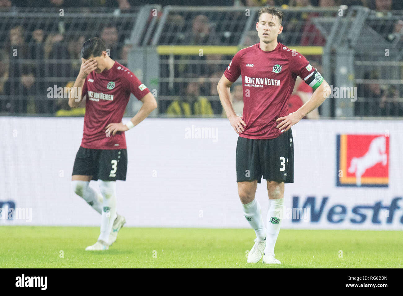Dortmund, Deutschland. 26th Jan, 2019. Miiko ALBORNOZ (left, H) and Waldemar ANTON (H) are disappointed, disappointed, disappointed, disappointed, sad, frustrated, frustrated, late-rate, full figure, landscape, Soccer 1. Bundesliga, 19. matchday, Borussia Dortmund (DO) - Hanover 96 (H) 5: 1, on 26.01.2019 in Dortmund/Germany. ¬ | usage worldwide Credit: dpa/Alamy Live News Stock Photo