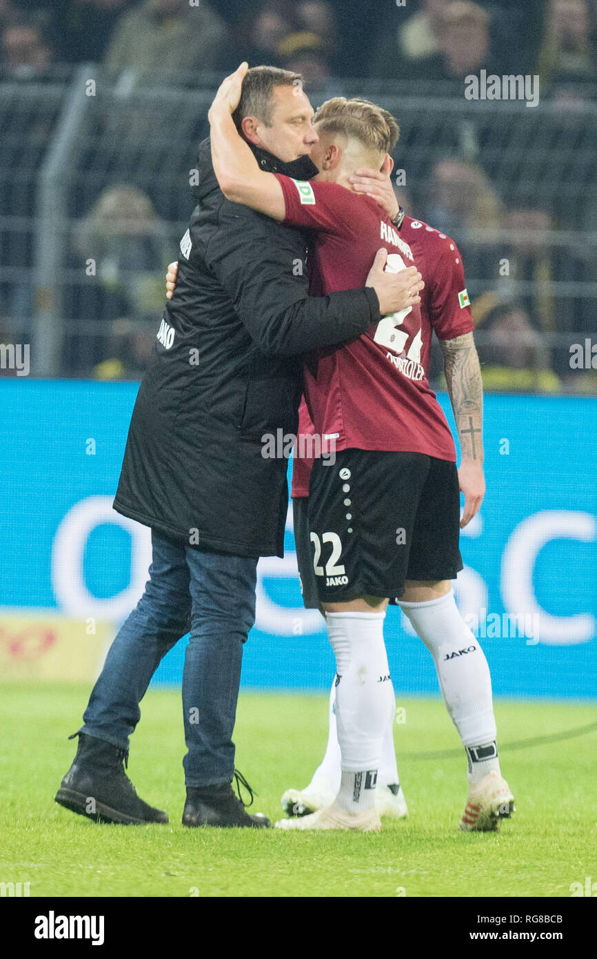 Dortmund, Deutschland. 26th Jan, 2019. Andre BREITENREITER (left, coach, H) hugs after the end of the game Matthias OSTRZOLEK (H), frustrated, frustrated, late, disappointed, disappointed, disappointment, disappointment, sad, full figure, portrait, football 1st Bundesliga, 19th matchday, Borussia Dortmund (DO) - Hanover 96 (H) 5: 1, on 26/01/2019 in Dortmund/Germany. ¬ | usage worldwide Credit: dpa/Alamy Live News Stock Photo