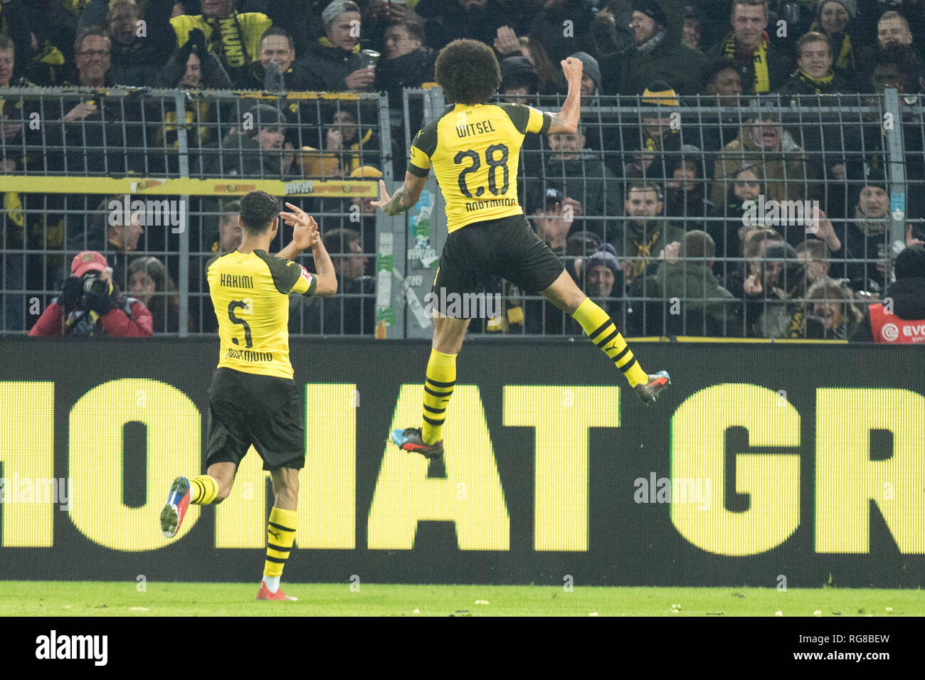 Dortmund, Deutschland. 26th Jan, 2019. goalkeeper Axel WITSEL (right, DO) and Achraf HAKIMI (DO) cheer on the goal to 5: 1 for Borussia Dortmund, jubilation, cheer, cheering, joy, cheers, celebrate, goaljubel, football 1st Bundesliga, 19th matchday, Borussia Dortmund (DO) - Hanover 96 (H) 5: 1, on 26/01/2019 in Dortmund/Germany. ¬ | usage worldwide Credit: dpa/Alamy Live News Stock Photo