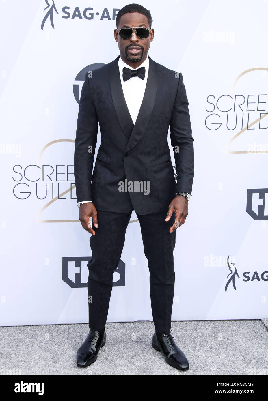 Los Angeles, United States. 27th Jan, 2019. LOS ANGELES, CA, USA - JANUARY  27: Actor Sterling K. Brown wearing a Zegna tux and shoes, IWC watch and  David Yurman cufflinks arrives at