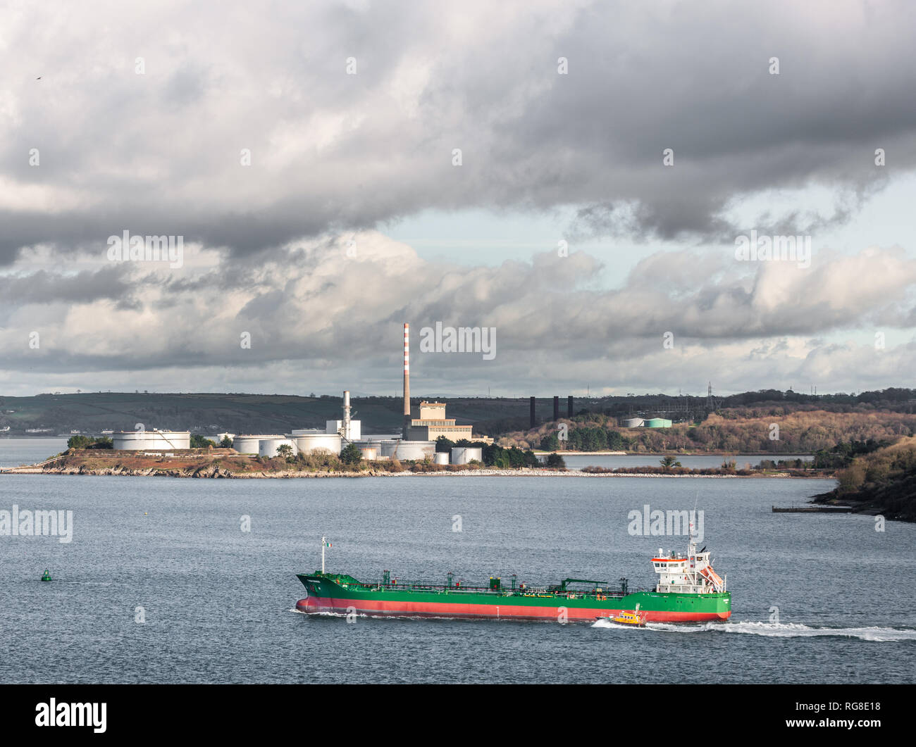 Whitegate, Cork, Ireland. 28th January, 2019. Oil tanker Thun Genius is escorted by the pilot boat Fáilte as it makes it was to the Oil Refinery at Whitegate, Co. Cork, Ireland. Credit: David Creedon/Alamy Live News Stock Photo