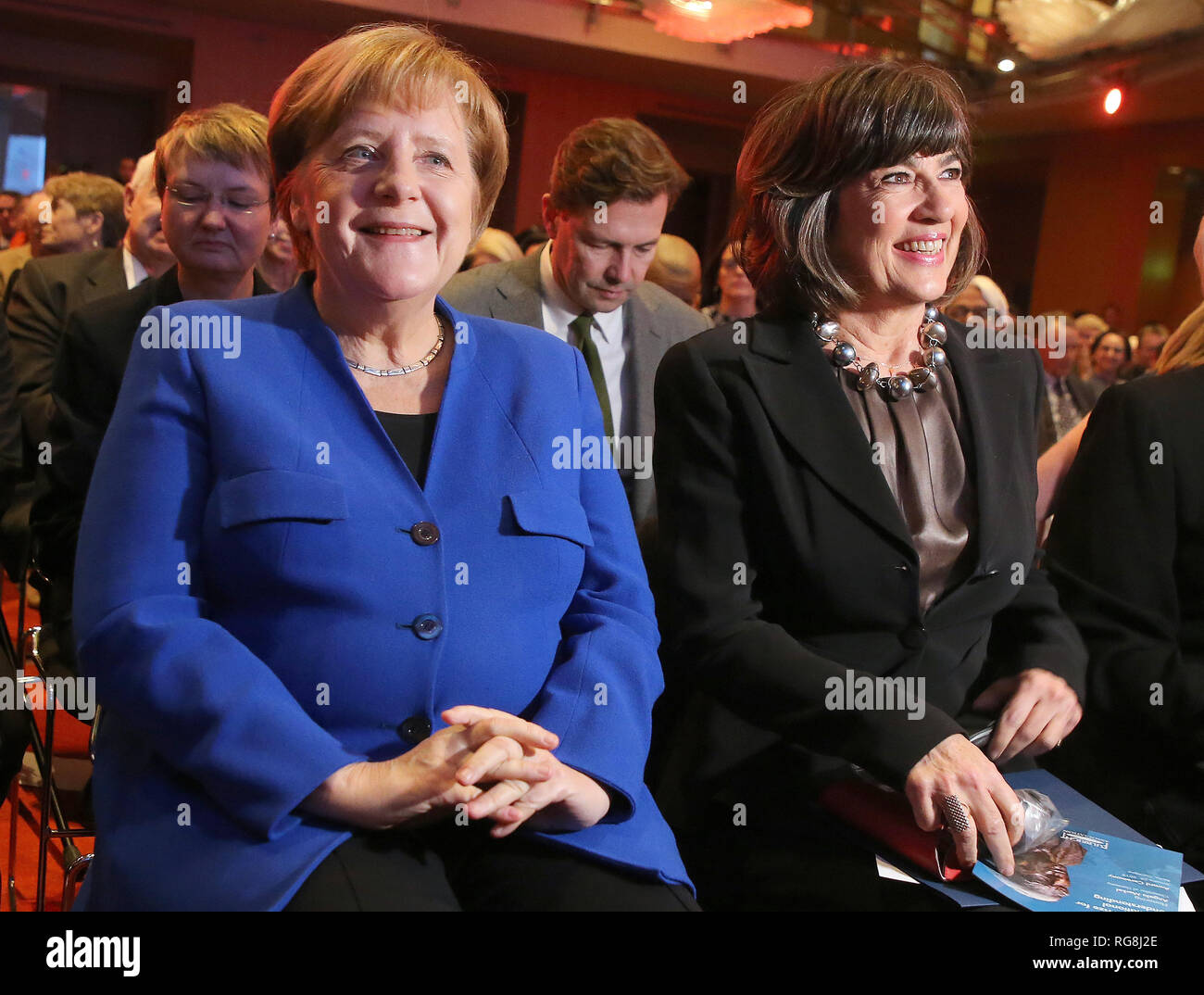 Berlin, Germany. 28th Jan, 2019. Federal Chancellor Angela Merkel (CDU) and Christiane Amanpour (r), journalist, sit in the first row of the Axica Congress and Conference Centre. Merkel receives the American Fulbright Prize for international understanding. Credit: Wolfgang Kumm/dpa/Alamy Live News Stock Photo