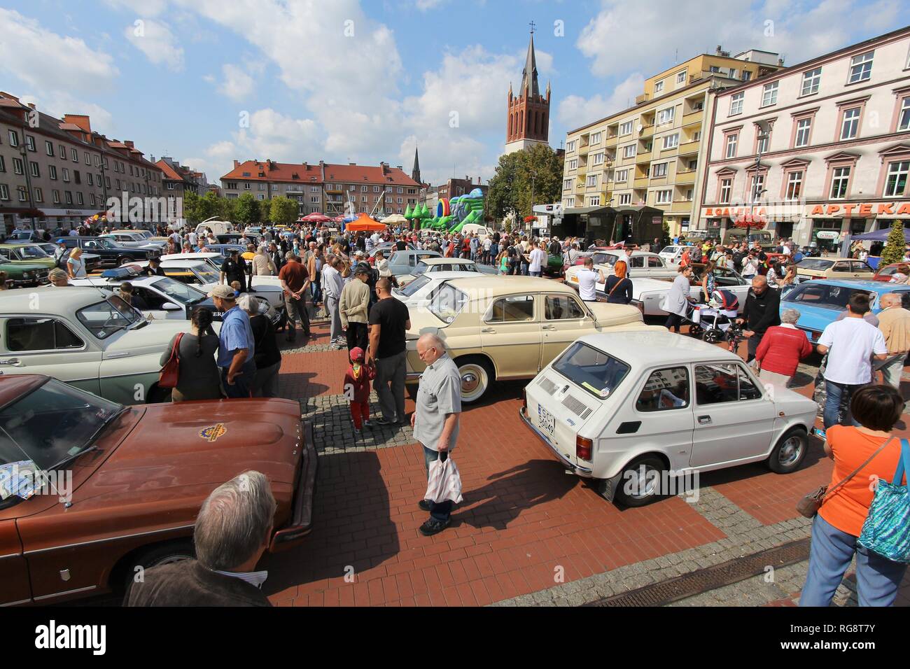 BYTOM, POLAND - SEPTEMBER 12, 2015: People admire classic oldtimer cars during 12th Historic Vehicle Rally in Bytom. The annual vehicle parade is one  Stock Photo