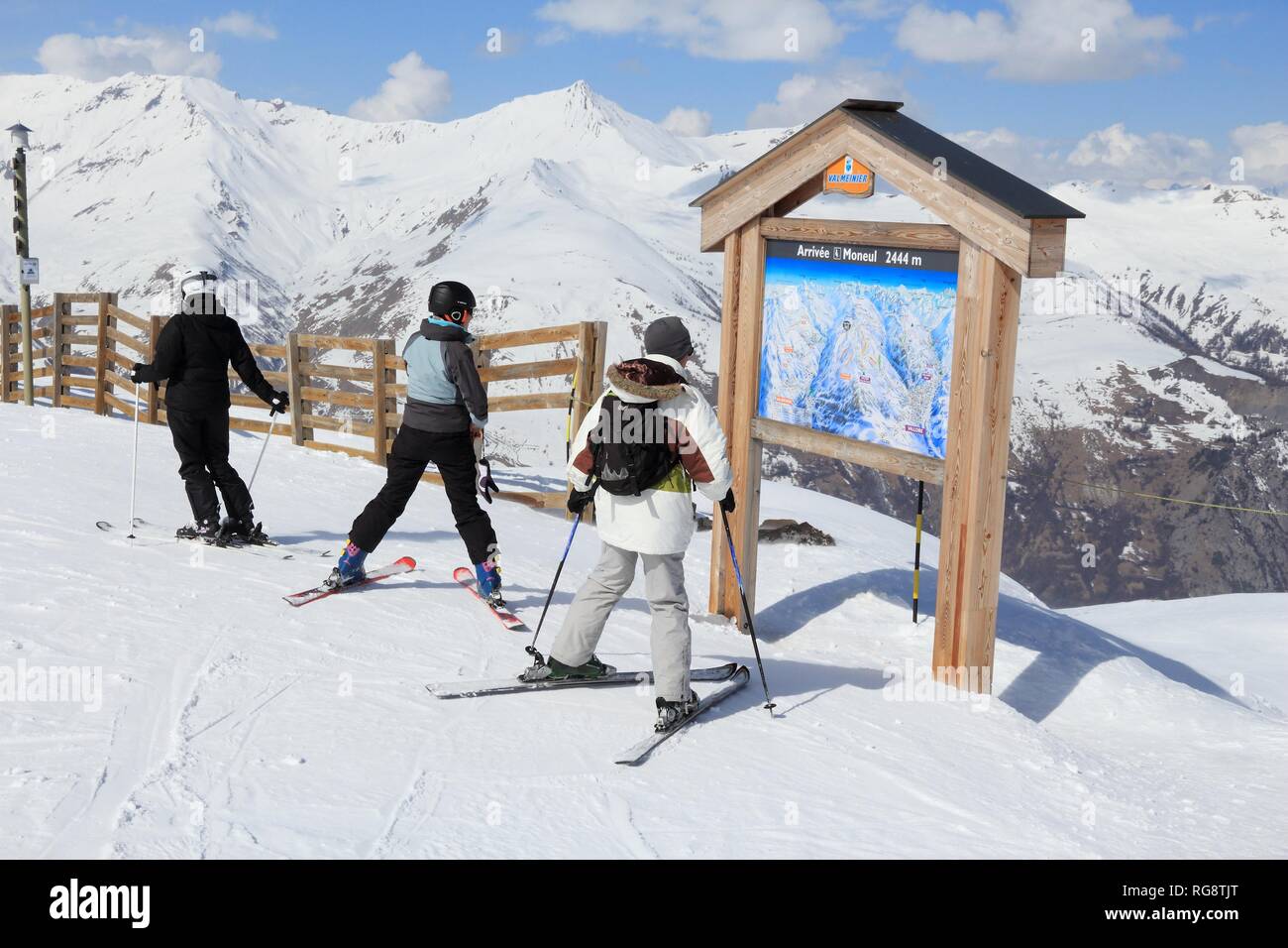 VALLOIRE, FRANCE - MARCH 24, 2015: Skier analyzes ski map in Galibier-Thabor station in France. The station is located in Valmeinier and Valloire and  Stock Photo