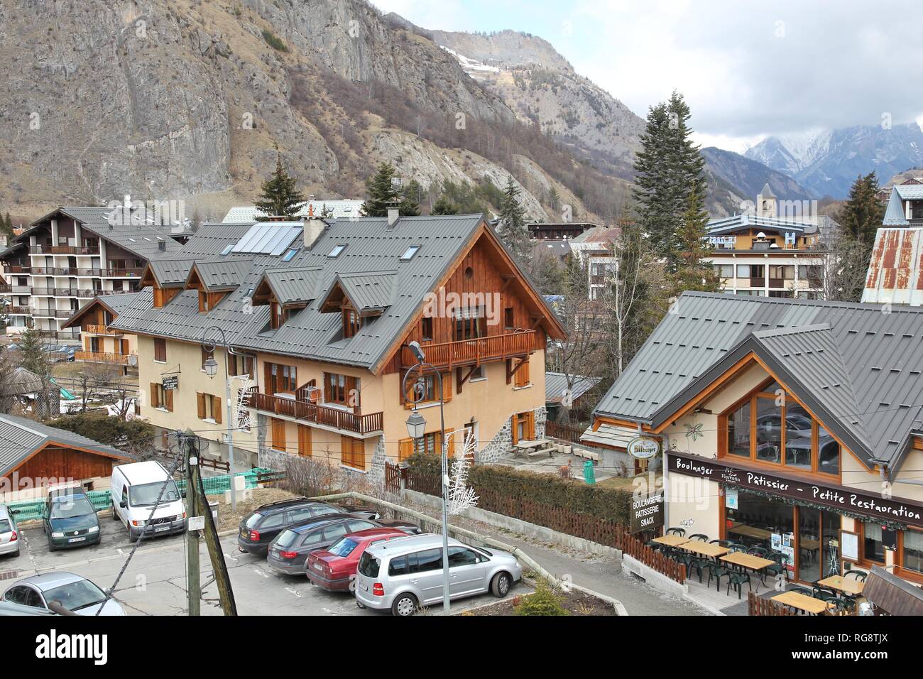 VALLOIRE, FRANCE - MARCH 27, 2015: Ski resort town of Valloire in France. The skiing station here has 150km of ski runs. Stock Photo
