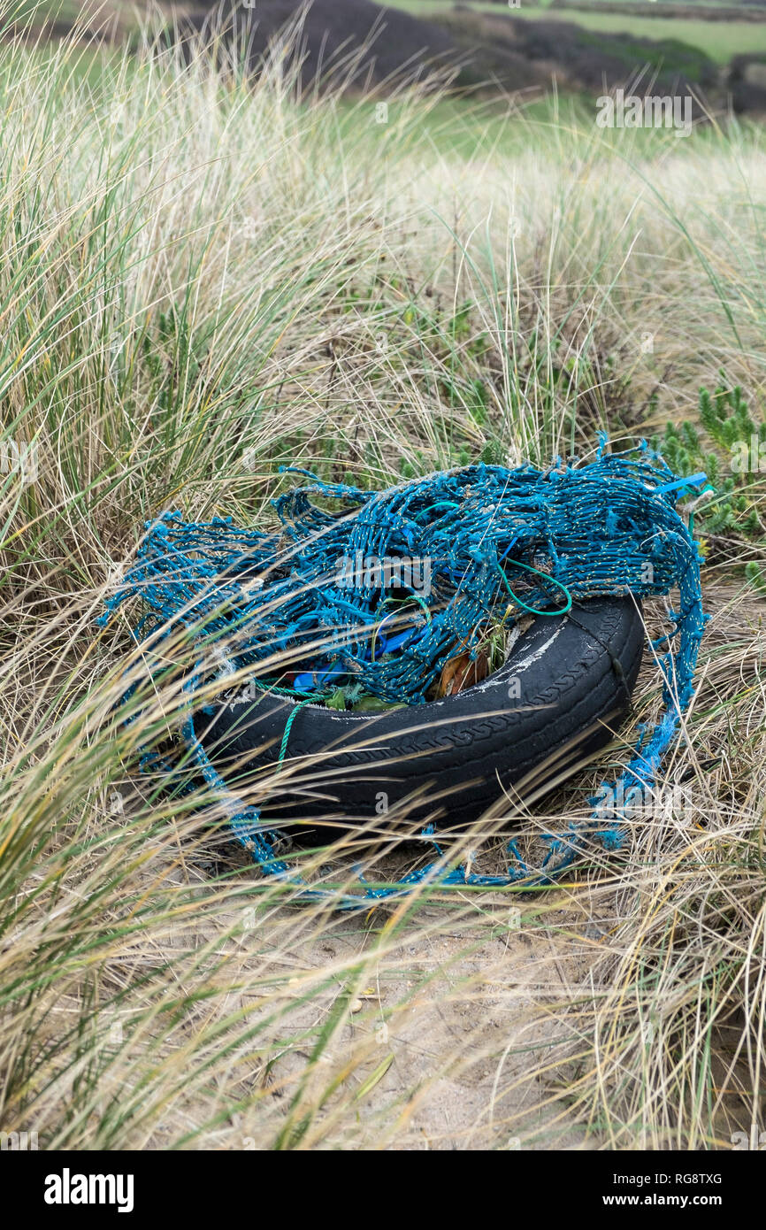 A pile of plastic and rubber rubbish collected from a beach in Cornwall. Stock Photo