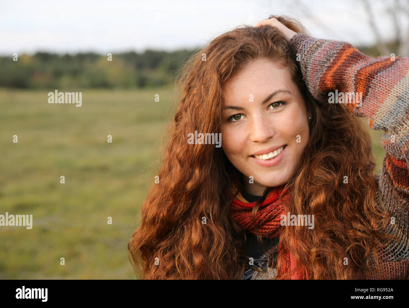 Portrait of redheaded young woman in autumn Stock Photo - Alamy