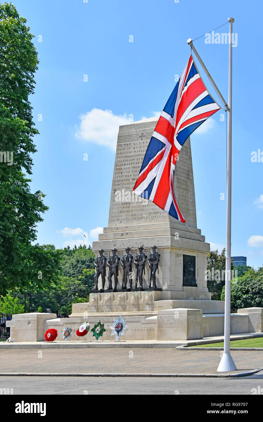 Guards war memorial first & second world war with five wreath & bronze sculpture of each foot guards regiment with union jack flag London England UK Stock Photo