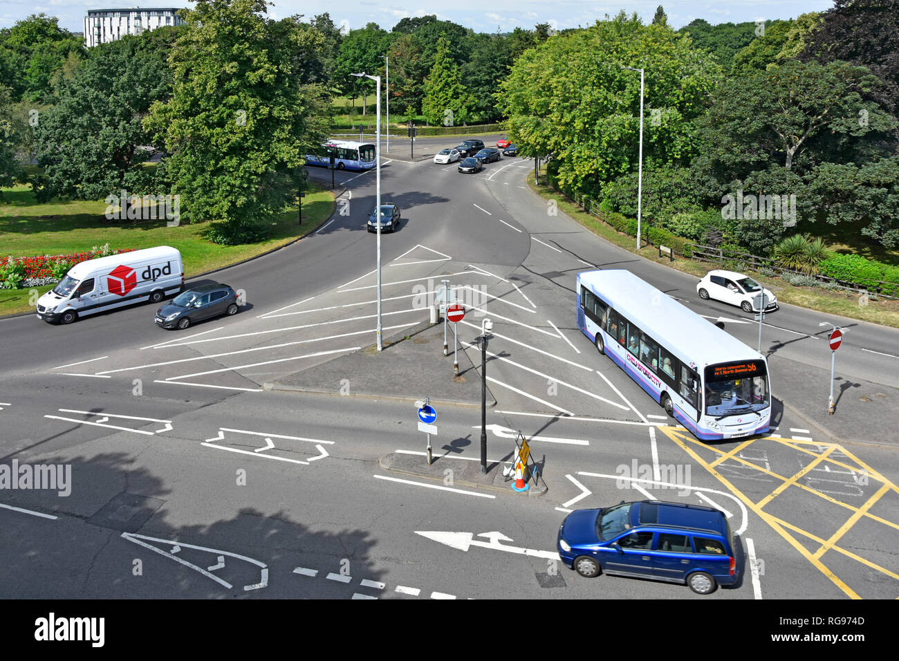 Aerial view looking down from above at traffic street scene with road & box junction markings bus cars and van town centre Chelmsford Essex England UK Stock Photo