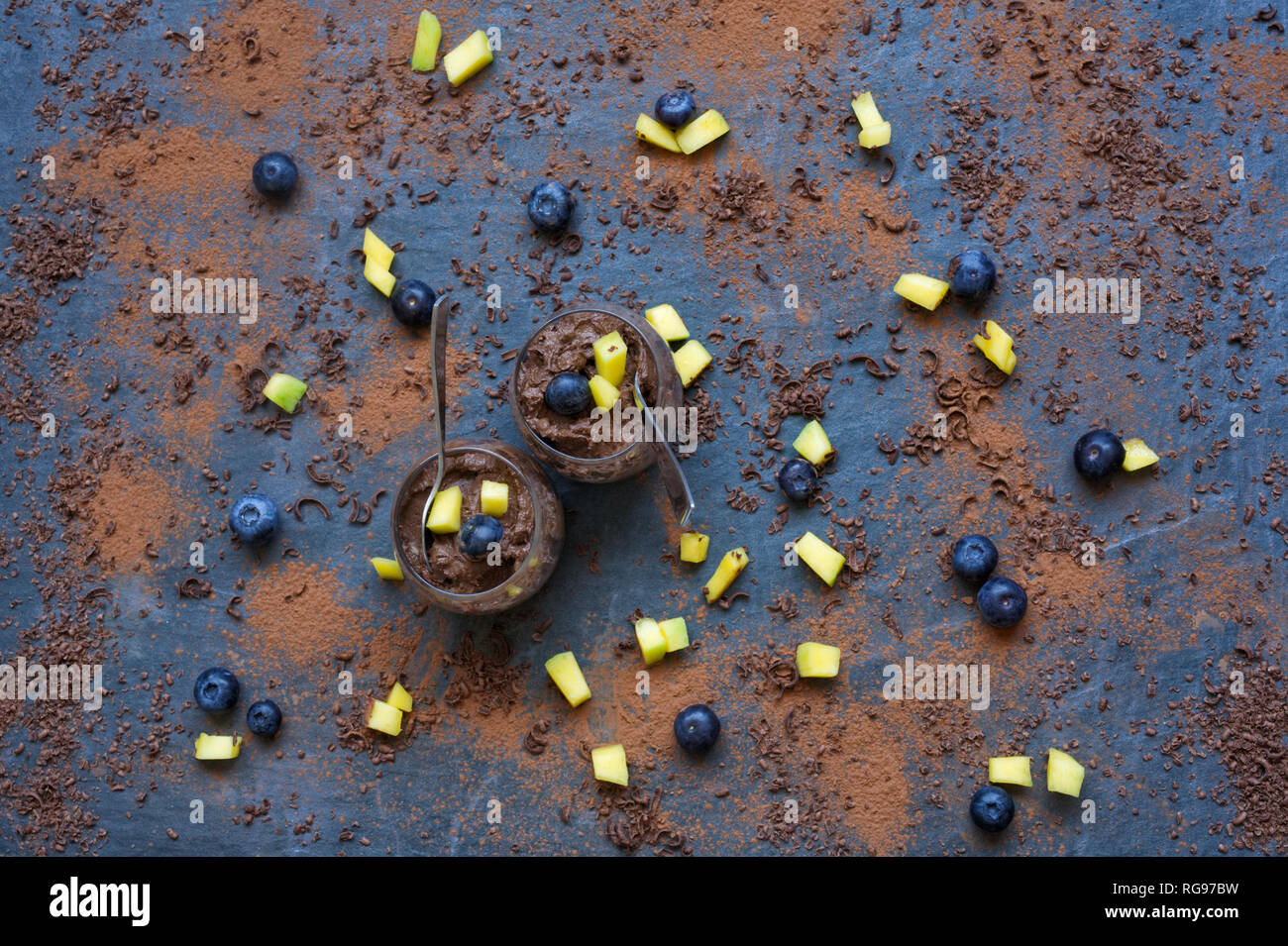 Chocolate Avocado mousse on a slate background. Stock Photo
