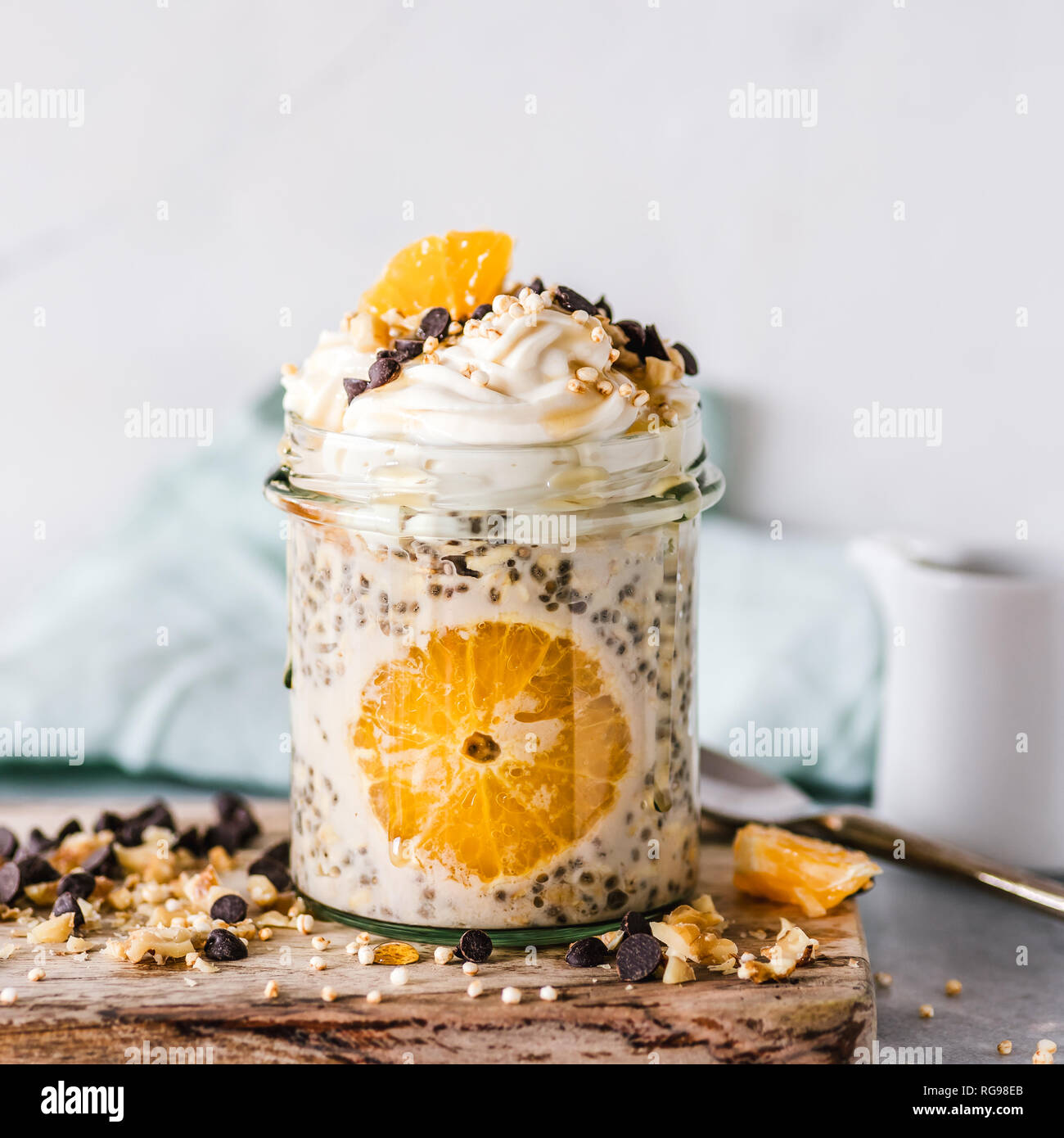 Orange chia oatmeal breakfast jar Stock Photo Alamy