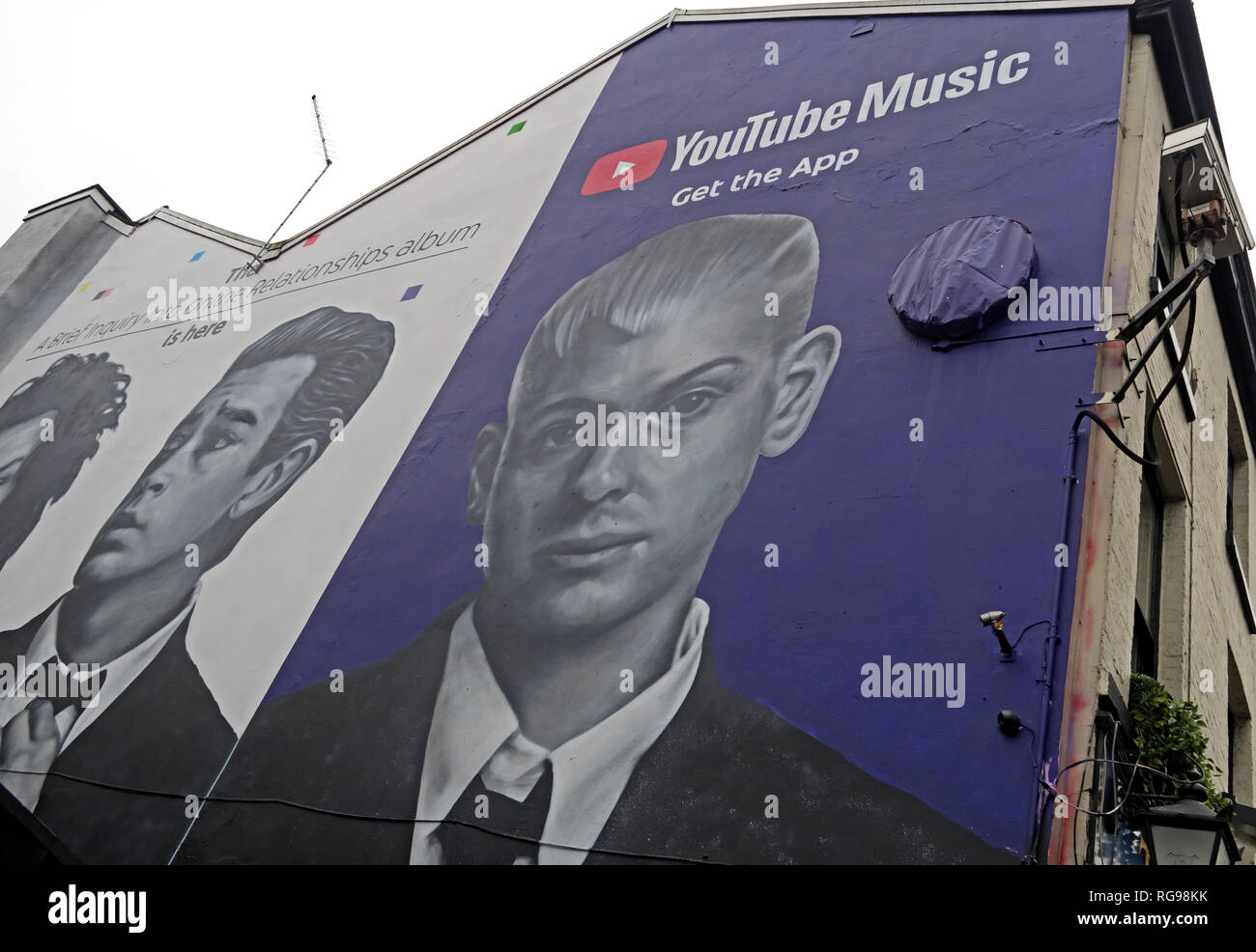 YouTube Music Get The App Advert, on gable end of building, Shude Hill, Manchester City Centre, North West England, UK, M4 2AF Stock Photo