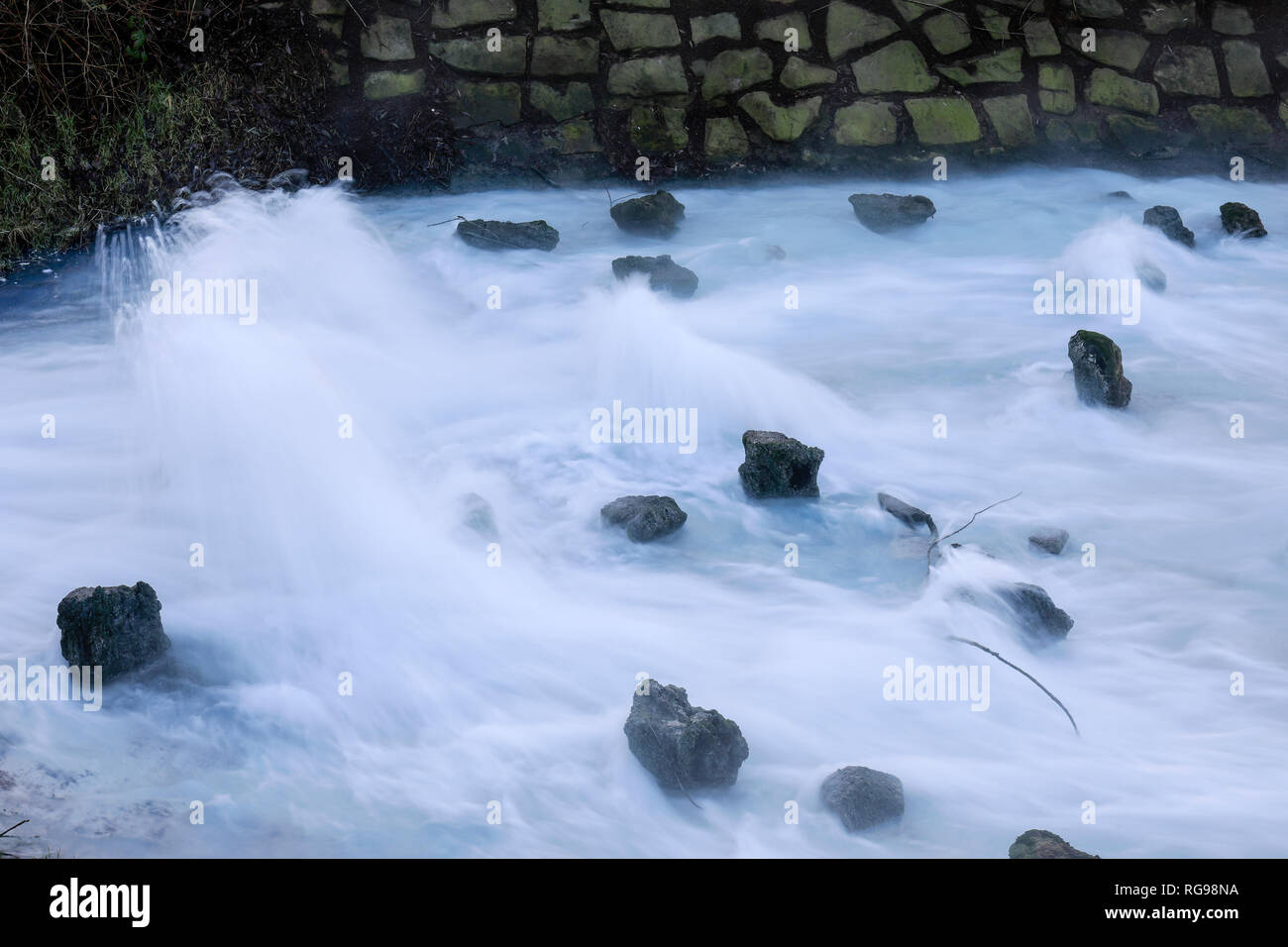 Bochum, Ruhr area, North Rhine-Westphalia, Germany - Waterinflow of mine water, the mineral rich shaft water from the closed mine Robert Mueser is led Stock Photo