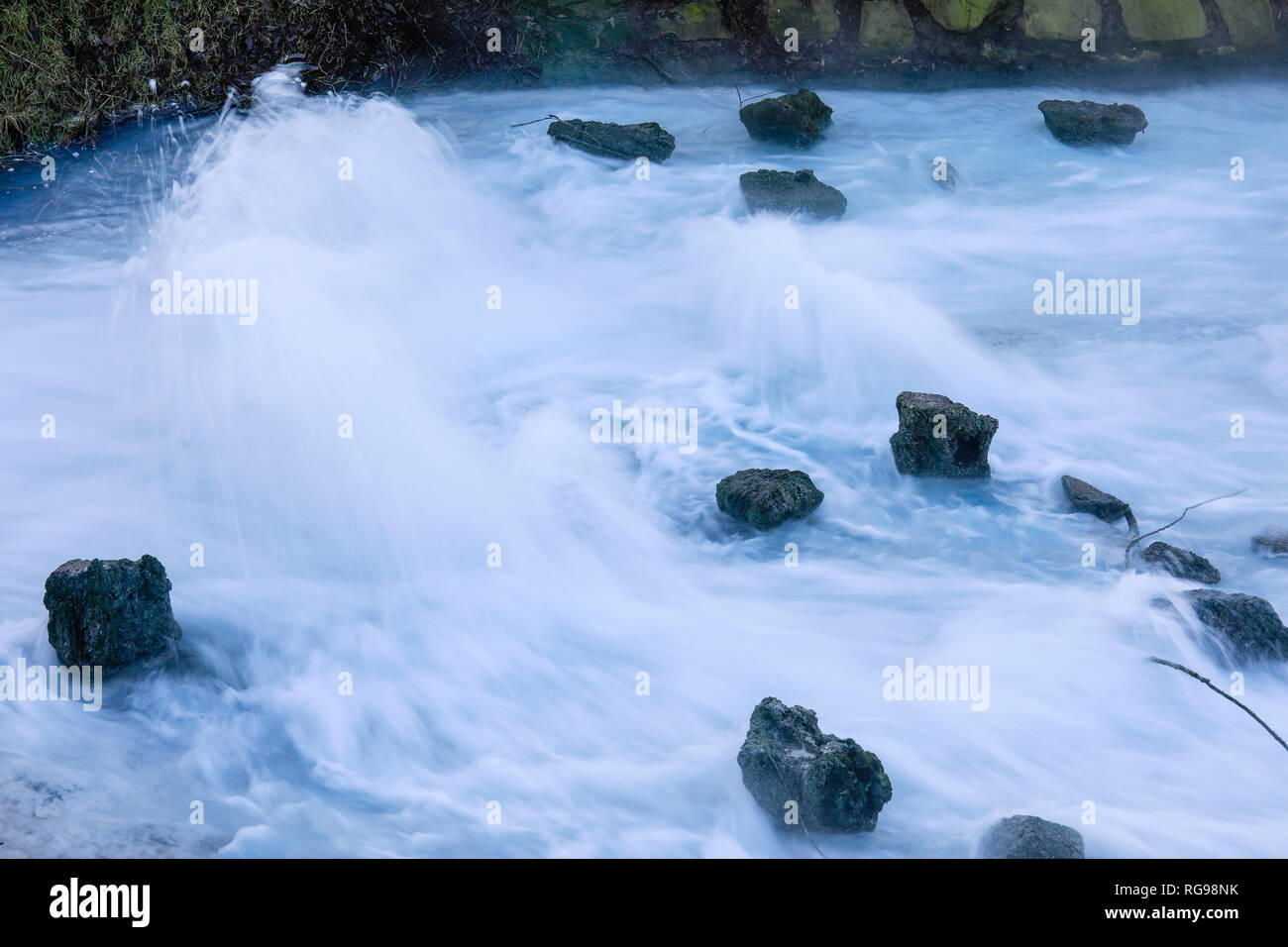 Bochum, Ruhr area, North Rhine-Westphalia, Germany - Waterinflow of mine water, the mineral rich shaft water from the closed mine Robert Mueser is led Stock Photo