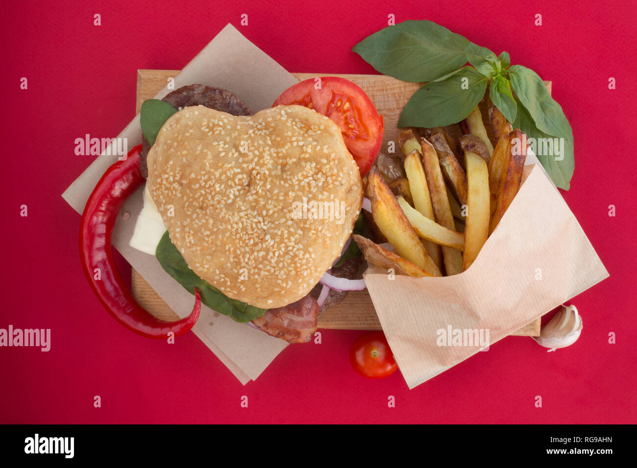 Heart shaped hamburger, love burger fast food concept, Valentines day