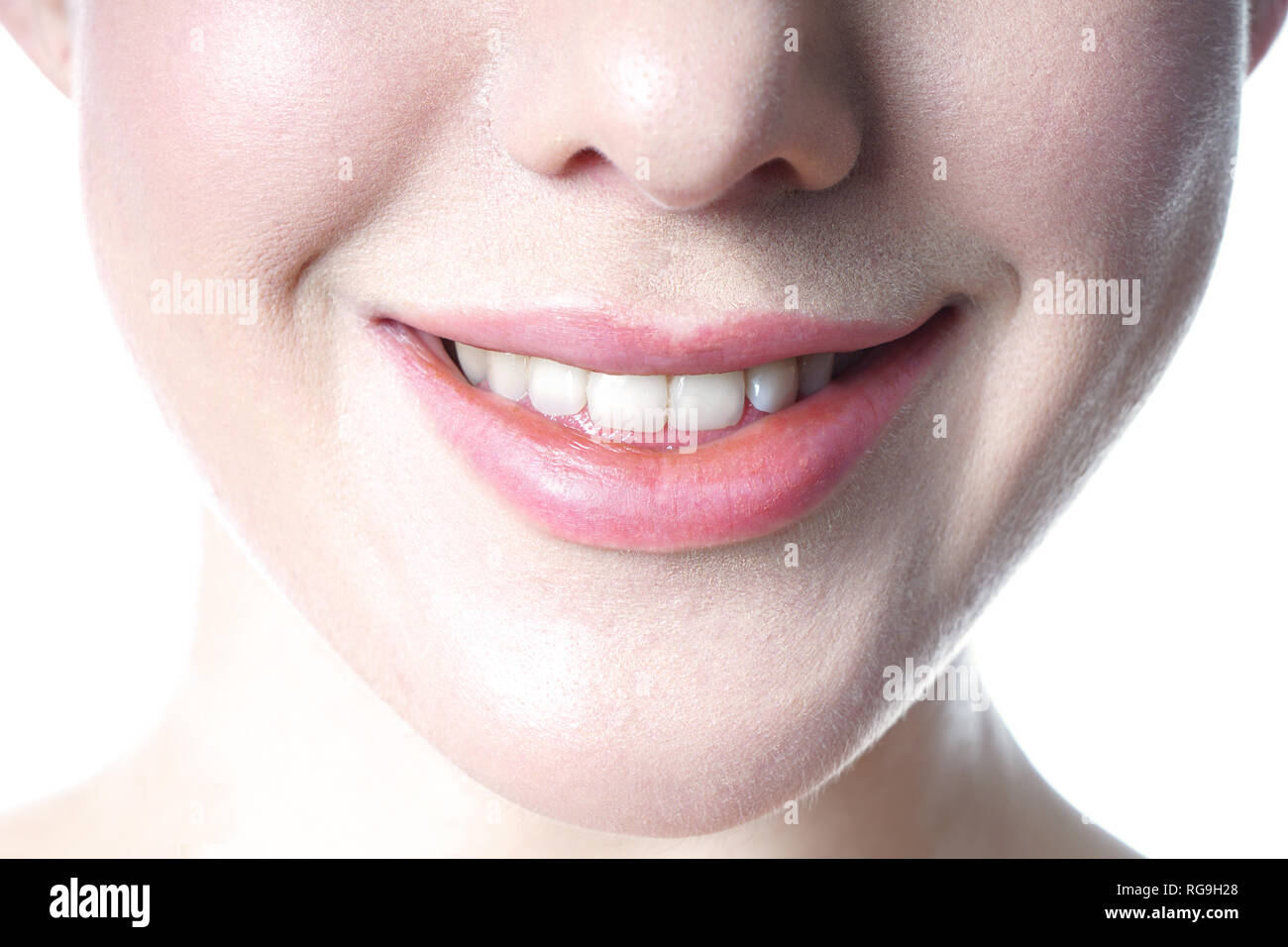 young woman with toothy smile close-up Stock Photo