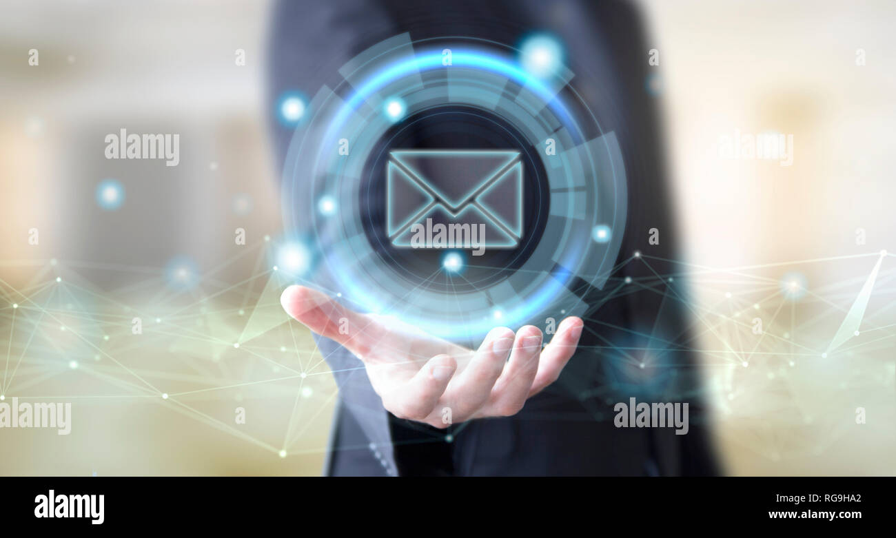 businessman hand with digital mail icon Stock Photo